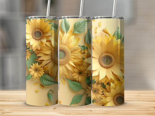Three tumblers with a detailed sunflower design on a wooden surface.