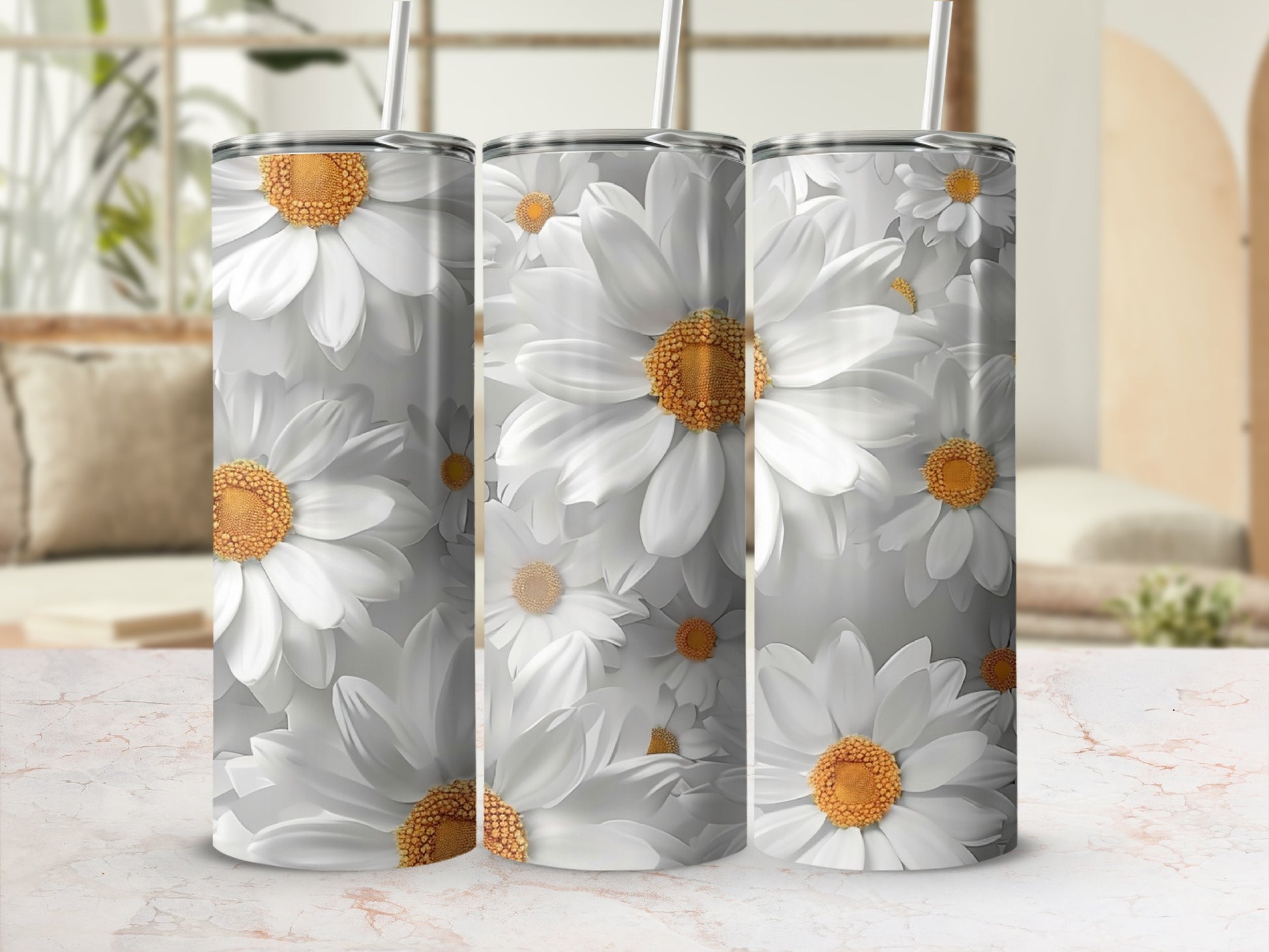 Three tumblers with a repeating pattern of white daisies and gray background.