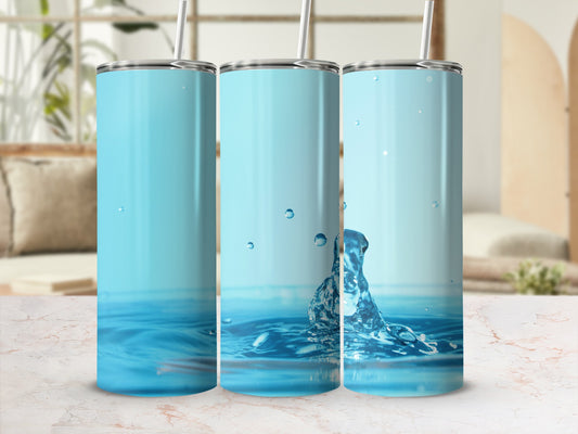 Three blue tumblers with water splash design.