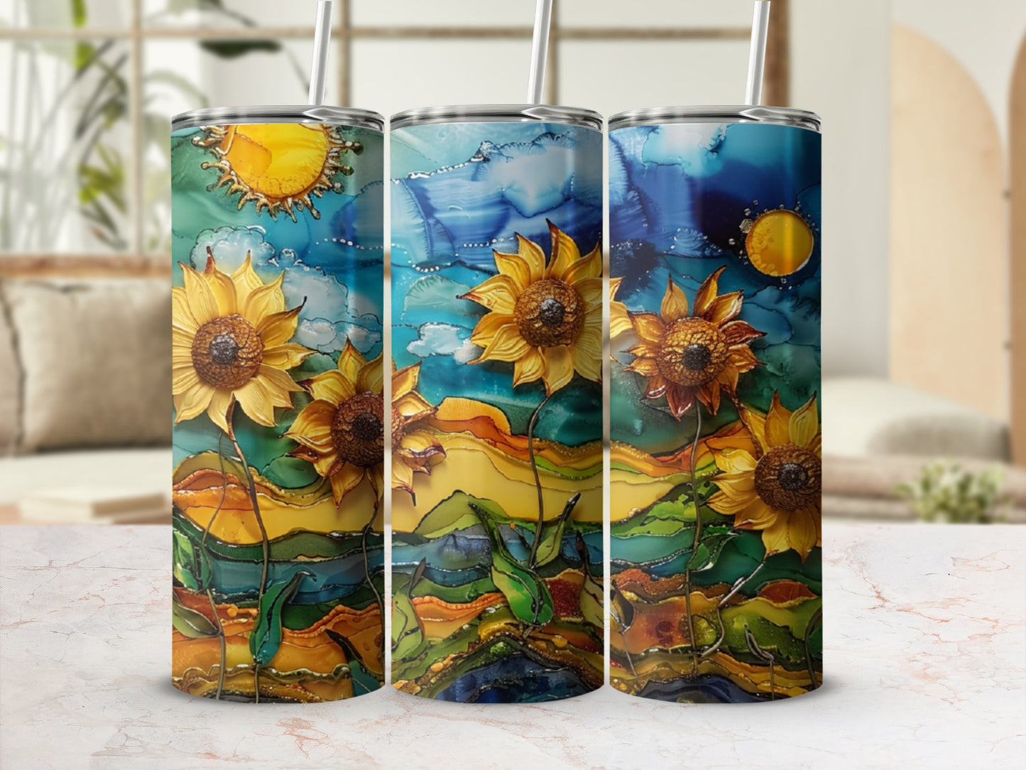 Three tumblers with sunflowers and abstract landscape designs.