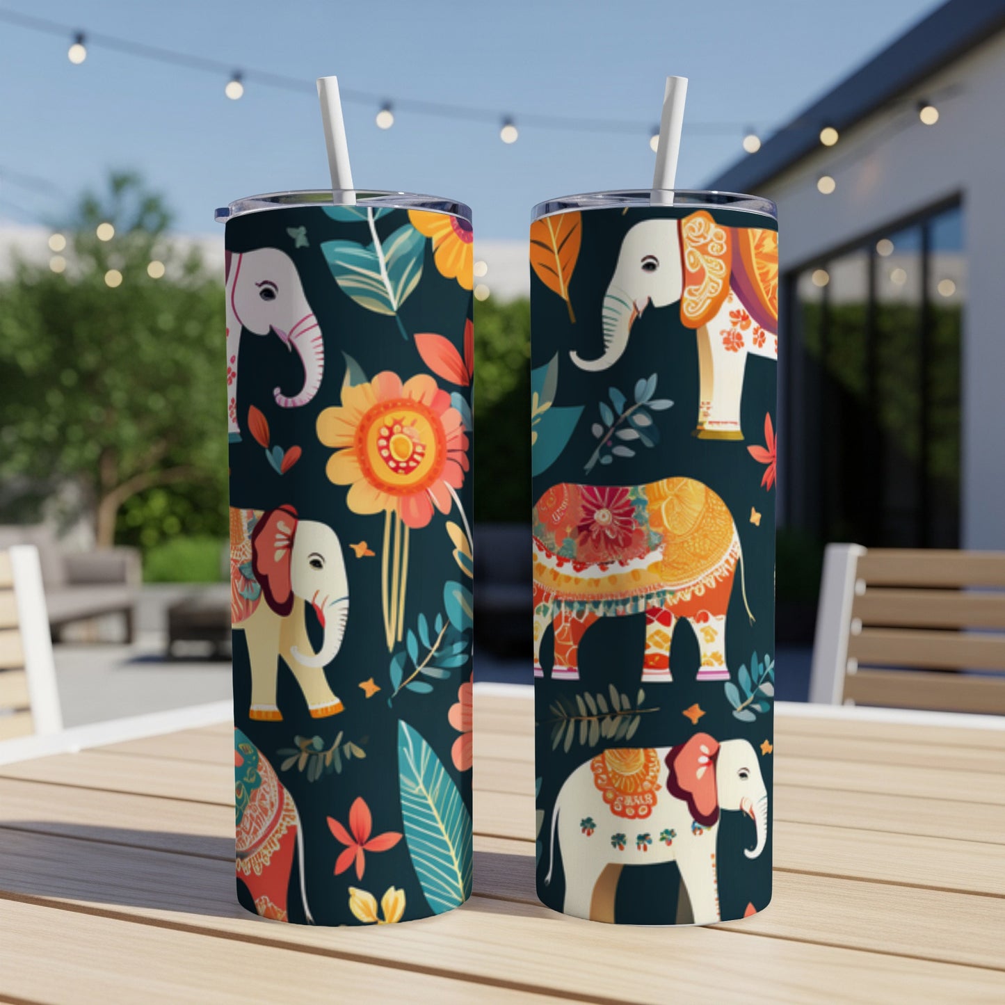 Two tumblers with a repeating pattern of elephants and floral motifs.