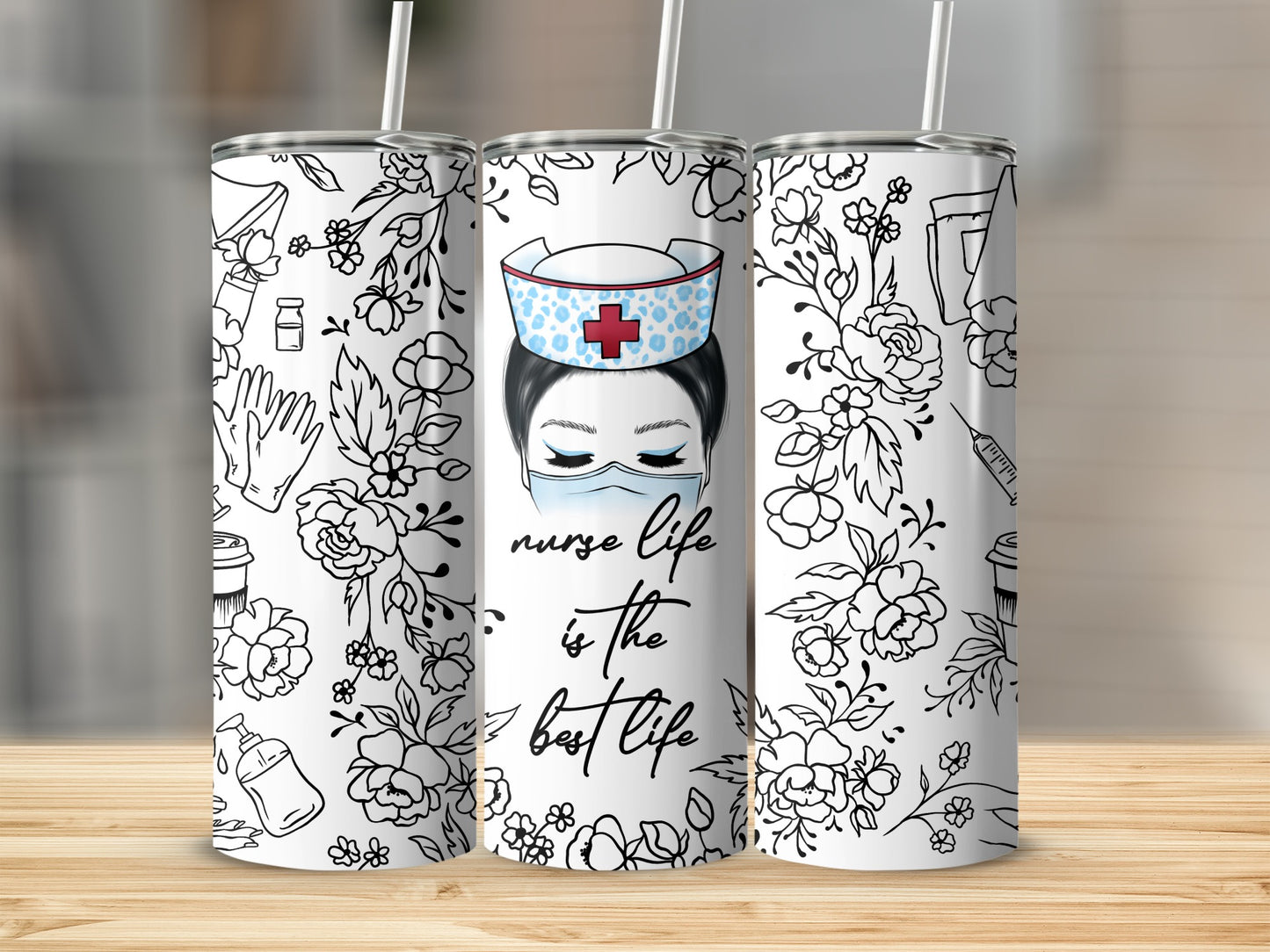 Nurse life is the best life tumbler with floral and medical icons.