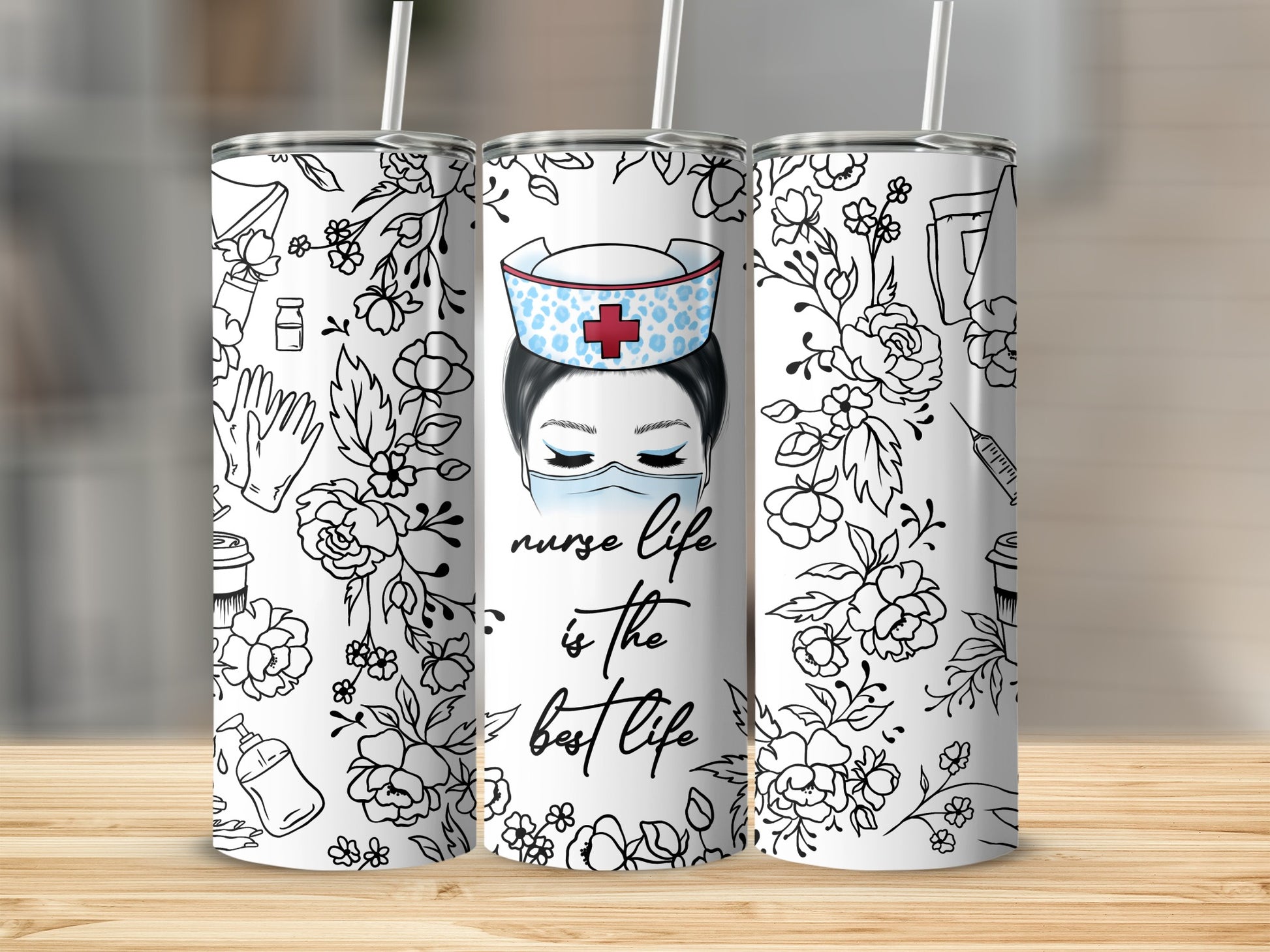 Nurse life is the best life tumbler with floral and medical icons.