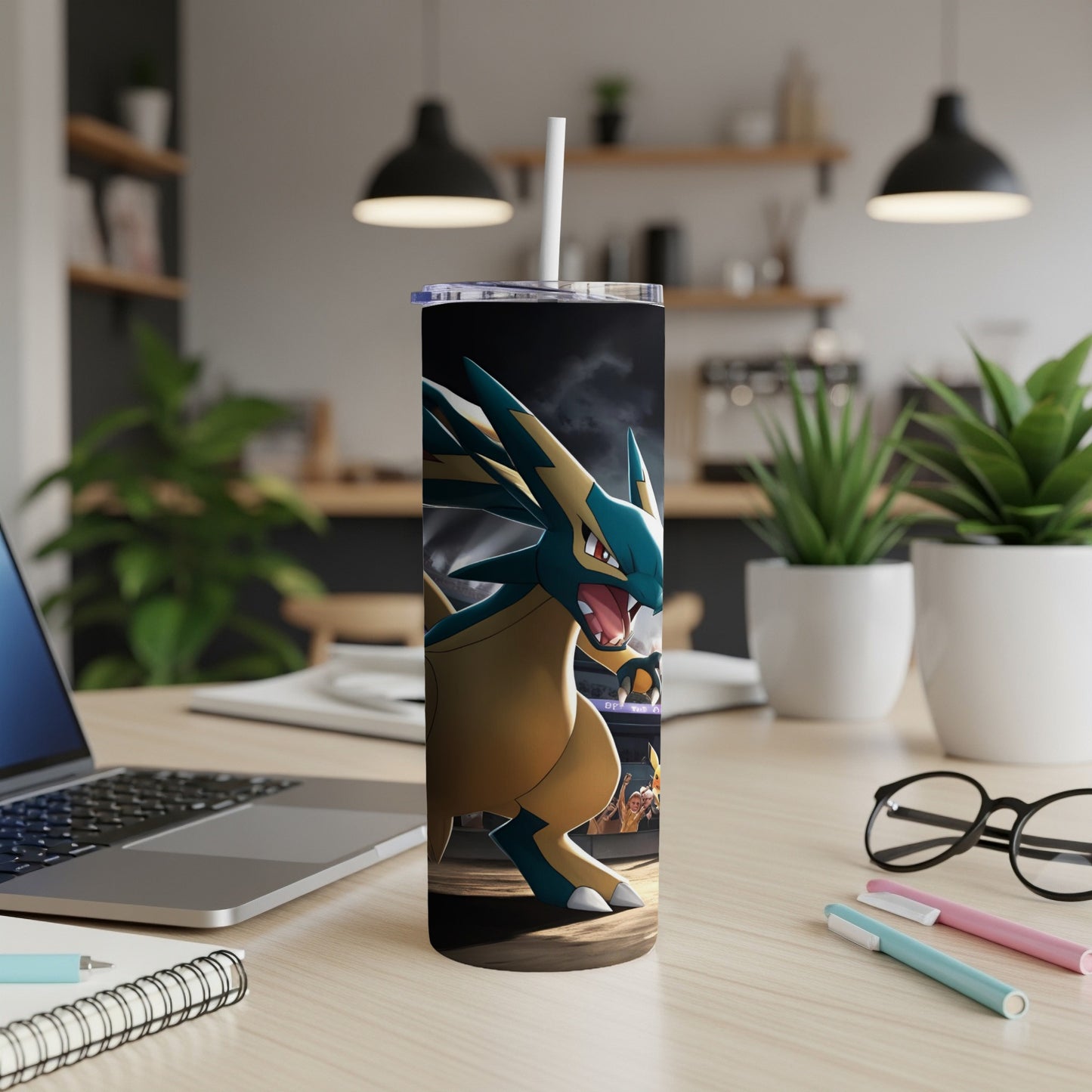Zekrom Pokemon on a blue and yellow tumbler with a white straw.