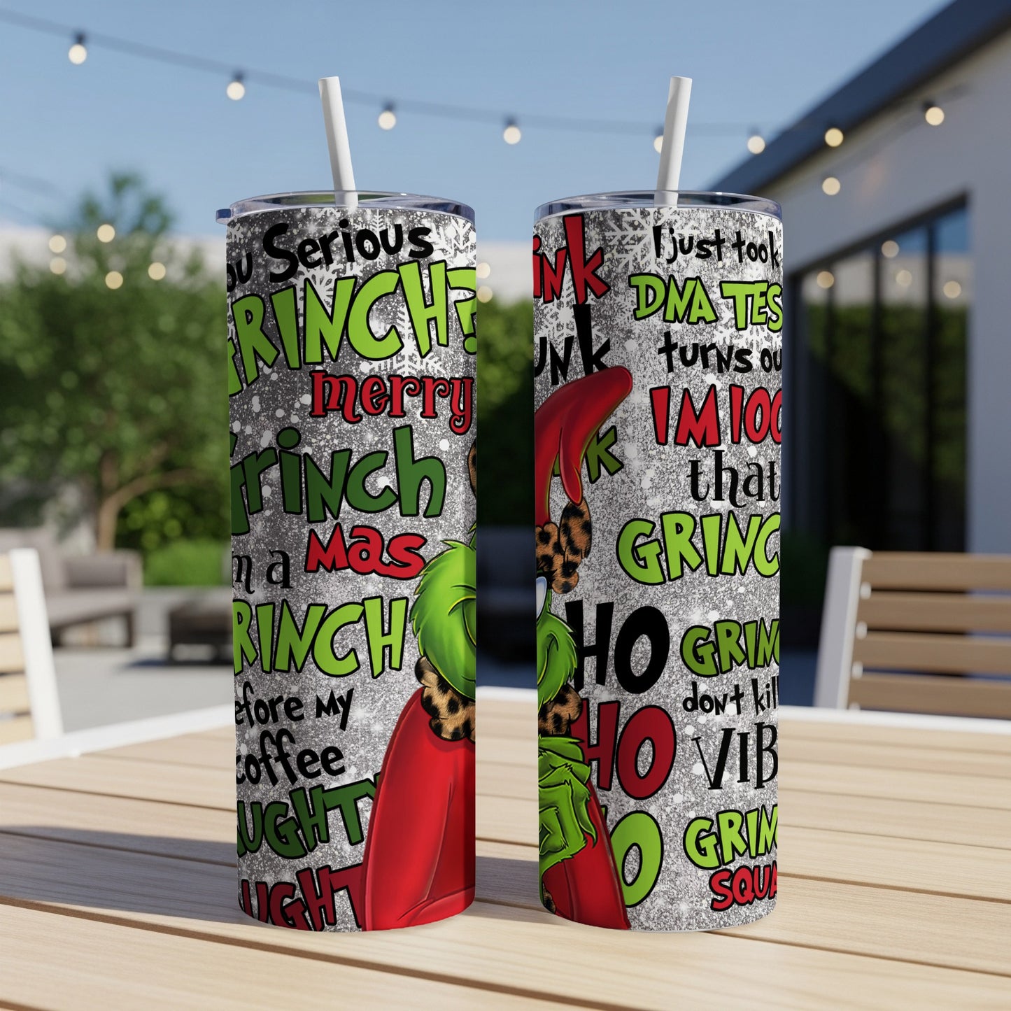 Grinch-themed tumbler with text and leopard print accents.