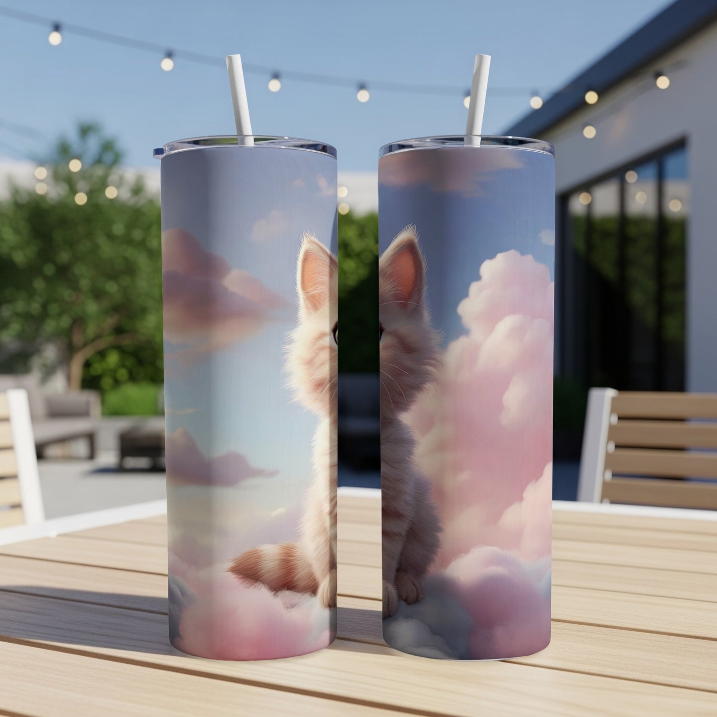 Two tumblers featuring a kitten sitting on pink clouds against a blue sky.