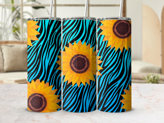Three tumblers with sunflower and blue zebra print designs.