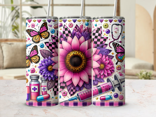 Three tumblers with colorful floral and medical designs, including butterflies, flowers, and syringes.