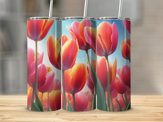 Three tumblers with a close-up image of vibrant red and orange tulips.