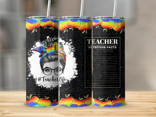 Teacher tumbler with rainbow apple accents and "Teacher Nutrition Facts" text.