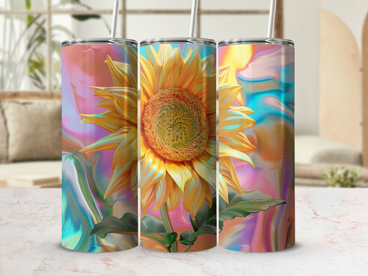 Three tumblers with a vibrant sunflower design on a marble surface.
