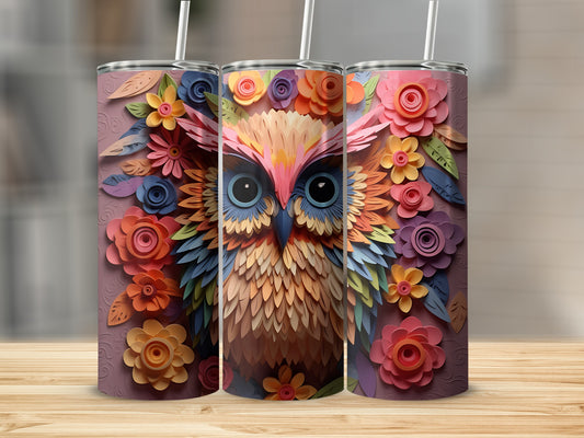 Three tumblers featuring a colorful floral owl design on a wooden surface.
