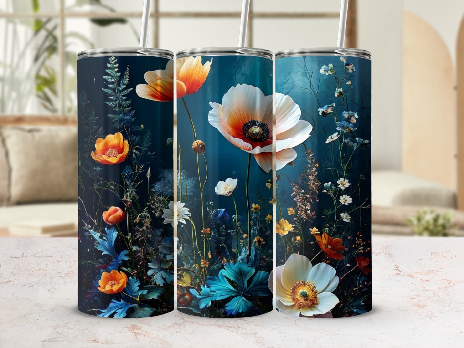 Three tumblers with a dark floral design featuring poppies and other wildflowers.