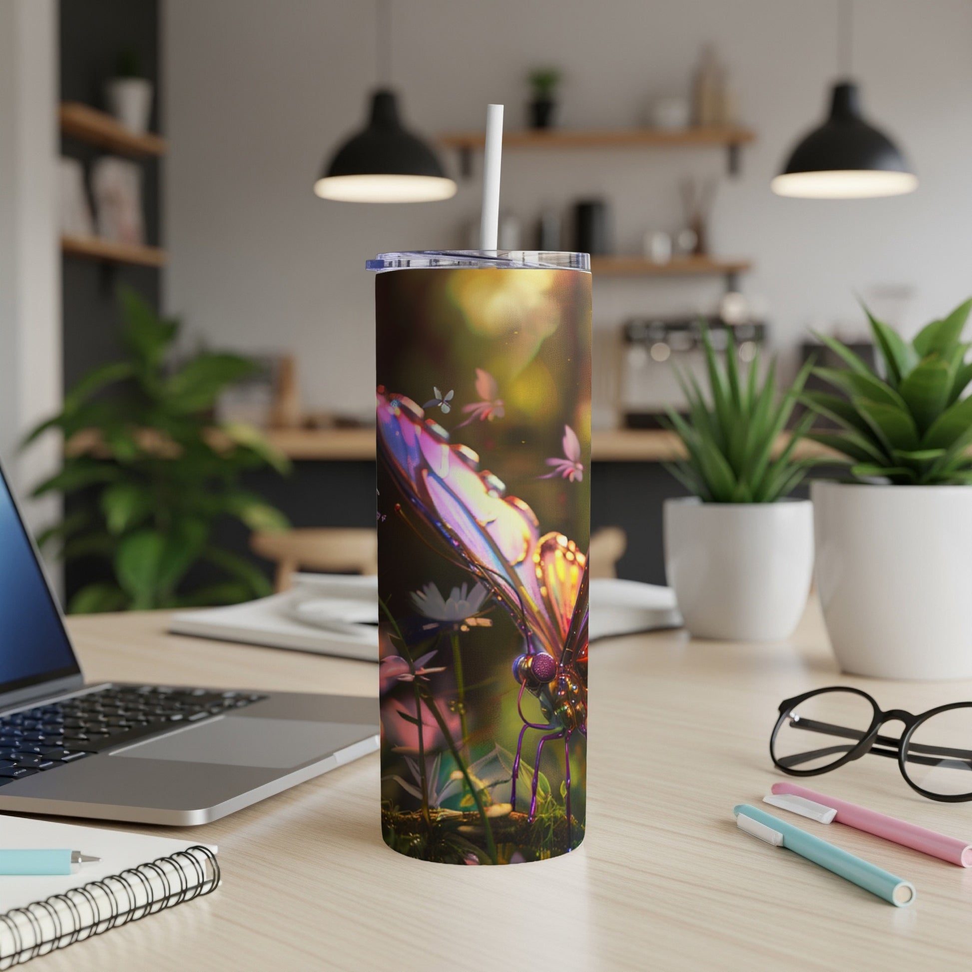 Close-up of a vibrant butterfly on a floral background with a straw in a tumbler.