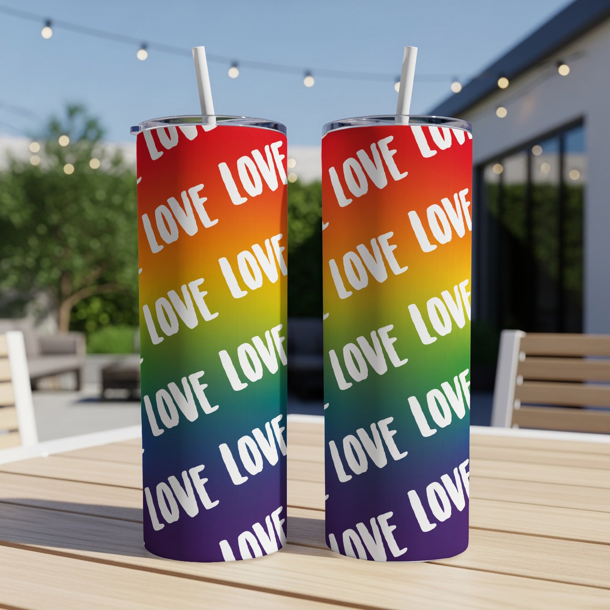 Two tumblers with rainbow stripes and repeated "LOVE" text.