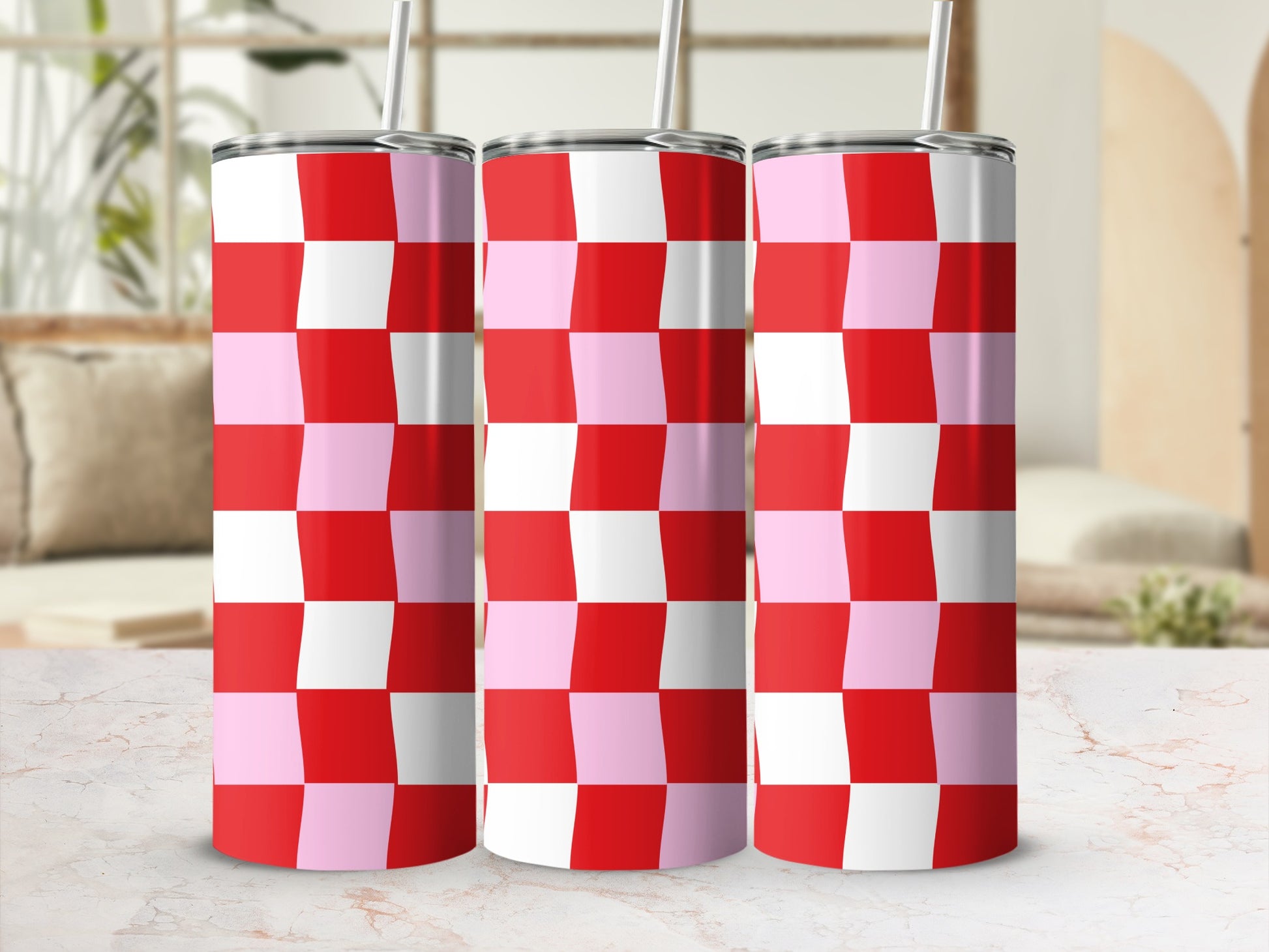 Three tumblers with pink and red checkerboard pattern.