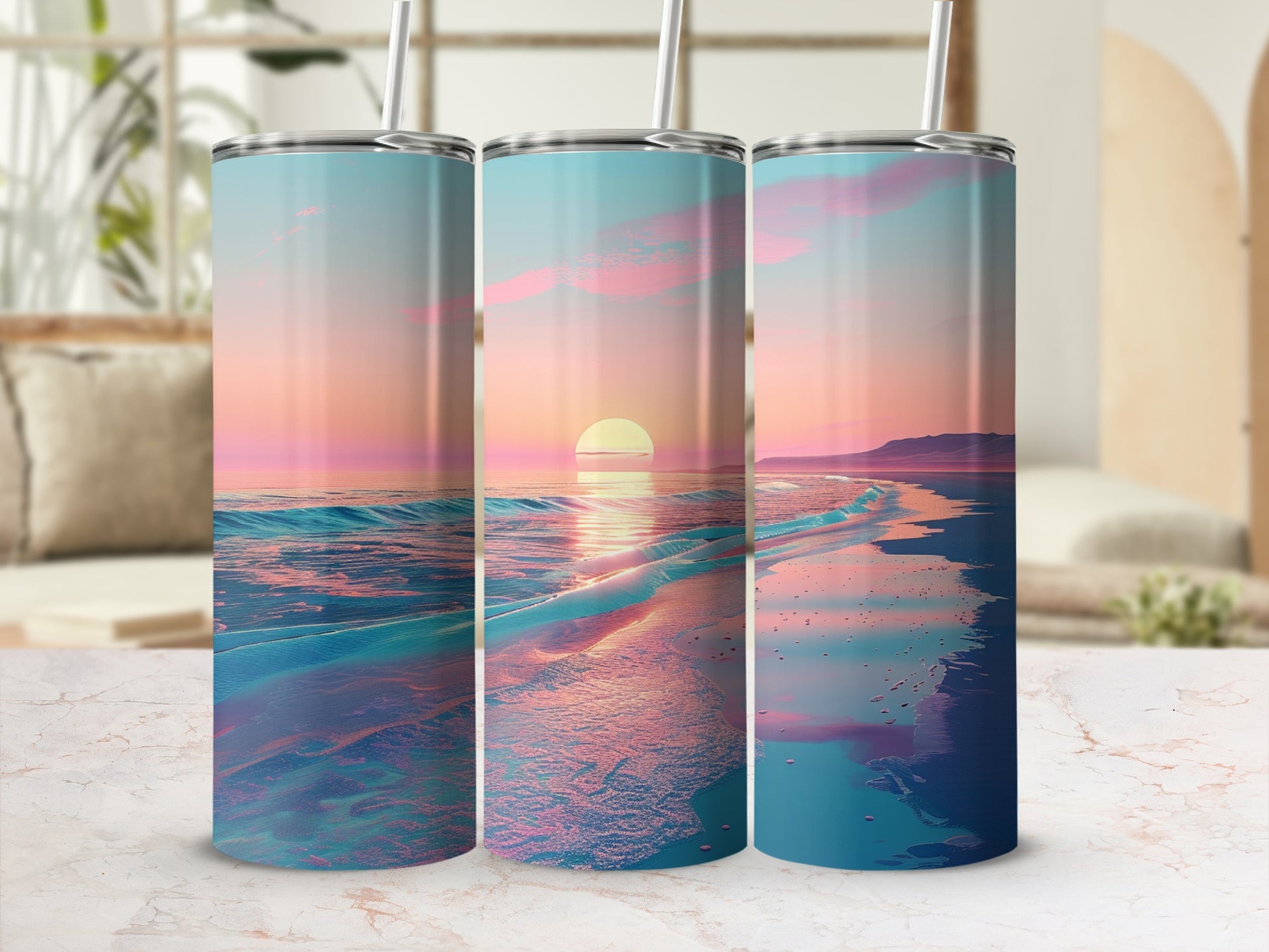 Three tall tumblers with a colorful sunset beach scene.