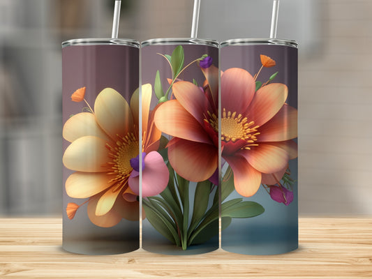 Tumbler with orange and pink flowers and green leaves.