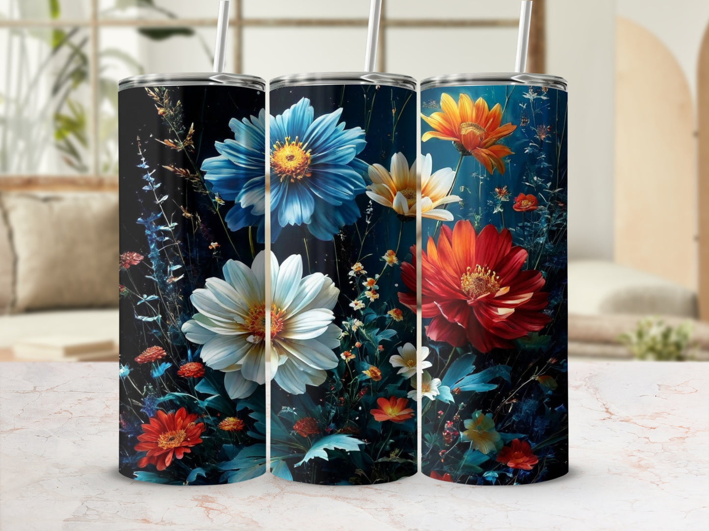 Three tumblers featuring vibrant floral designs against a dark background.
