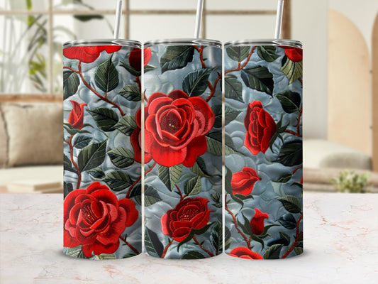 Three red rose tumblers with textured floral design.