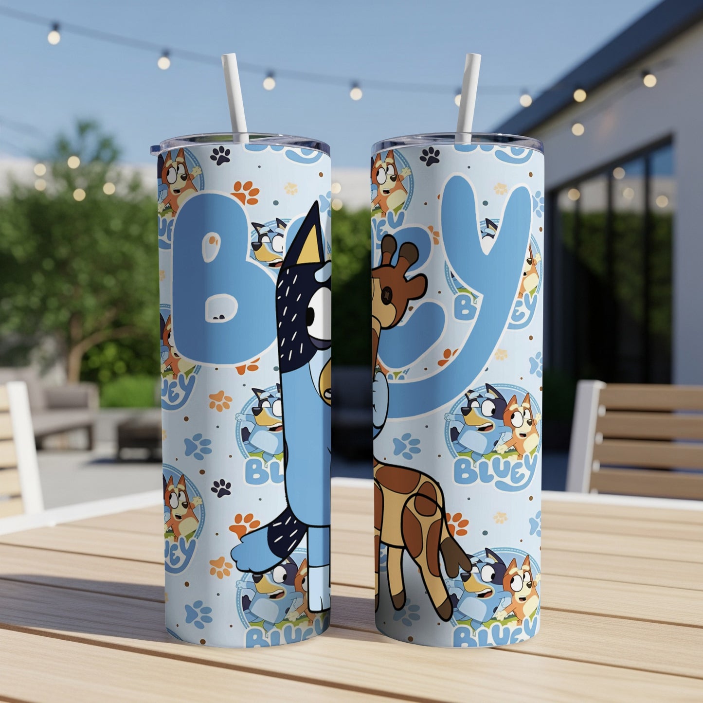 Two Bluey-themed tumblers with cartoon characters and paw prints.