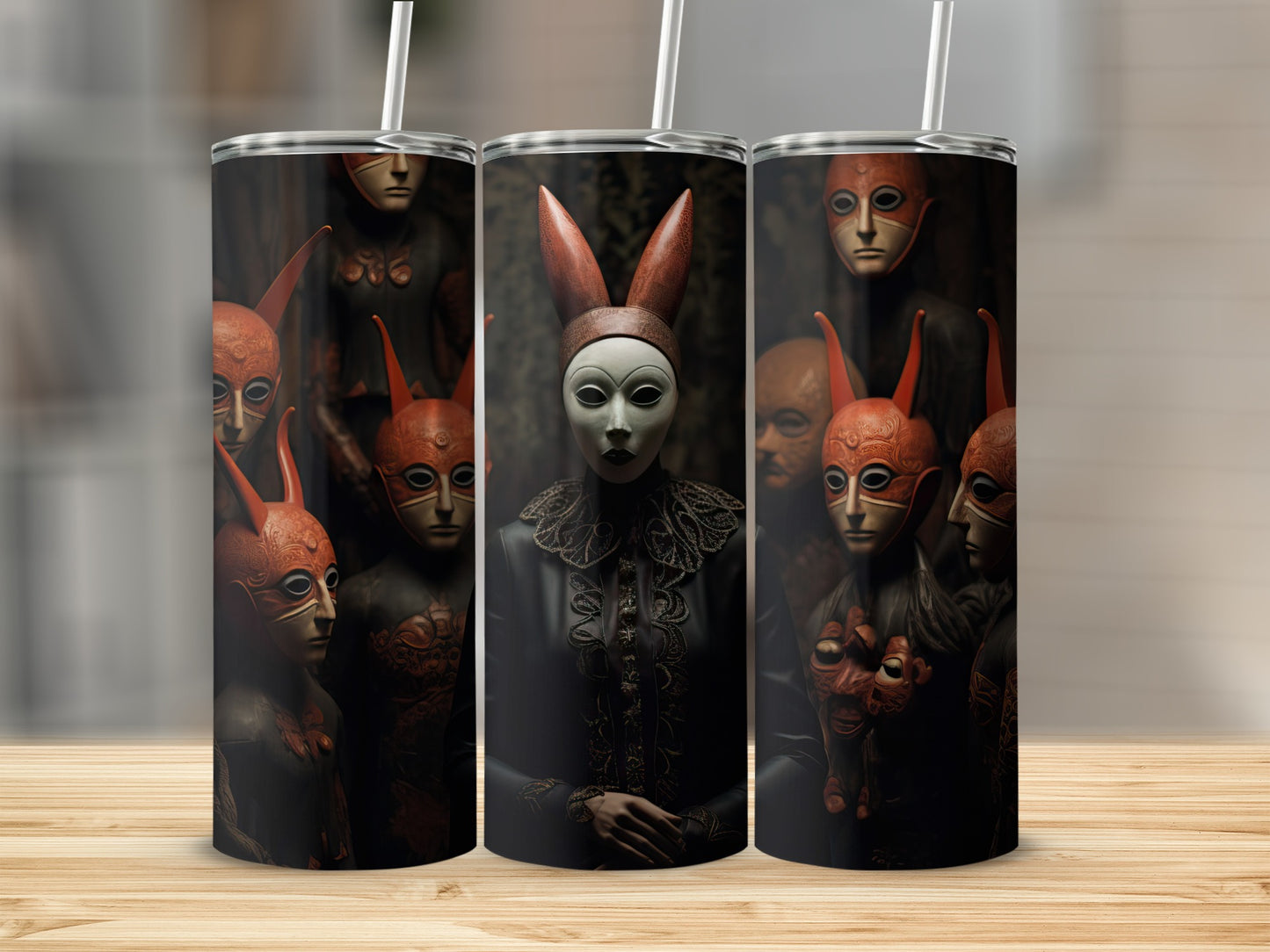 Three tumblers with dark, eerie masks and detailed clothing designs.
