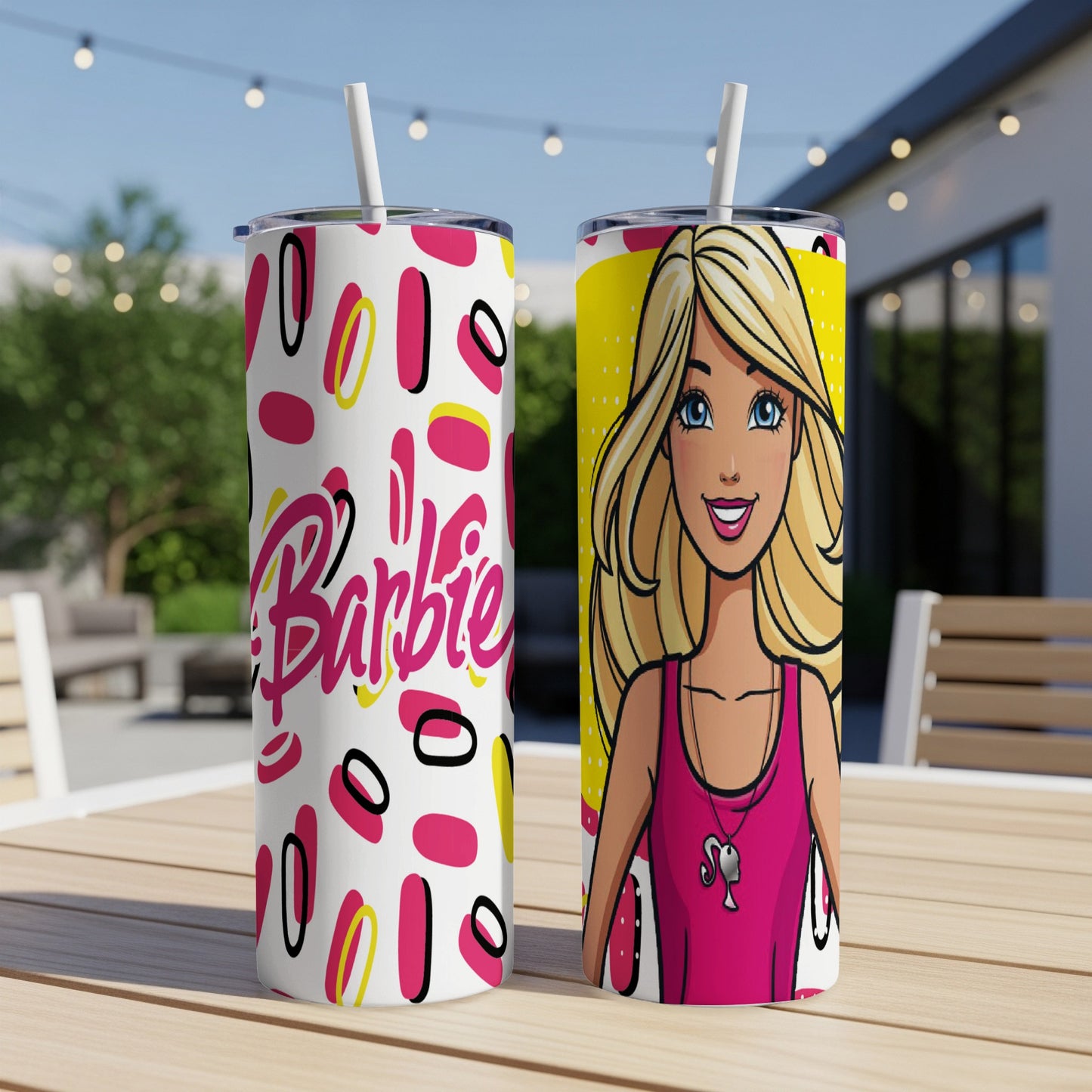 Two Barbie tumblers with straws, one with "Barbie" text, one with Barbie illustration.