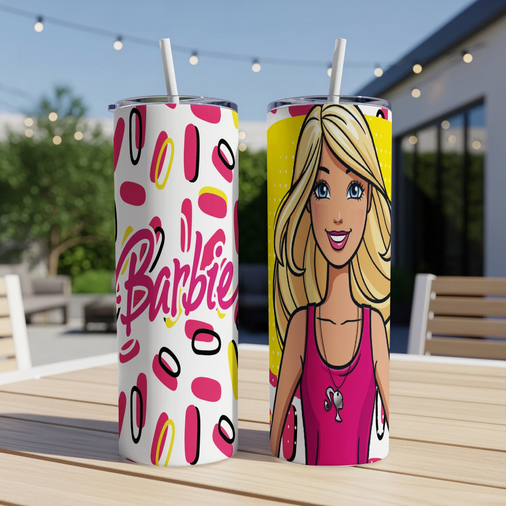 Two Barbie tumblers with straws, one with "Barbie" text, one with Barbie illustration.