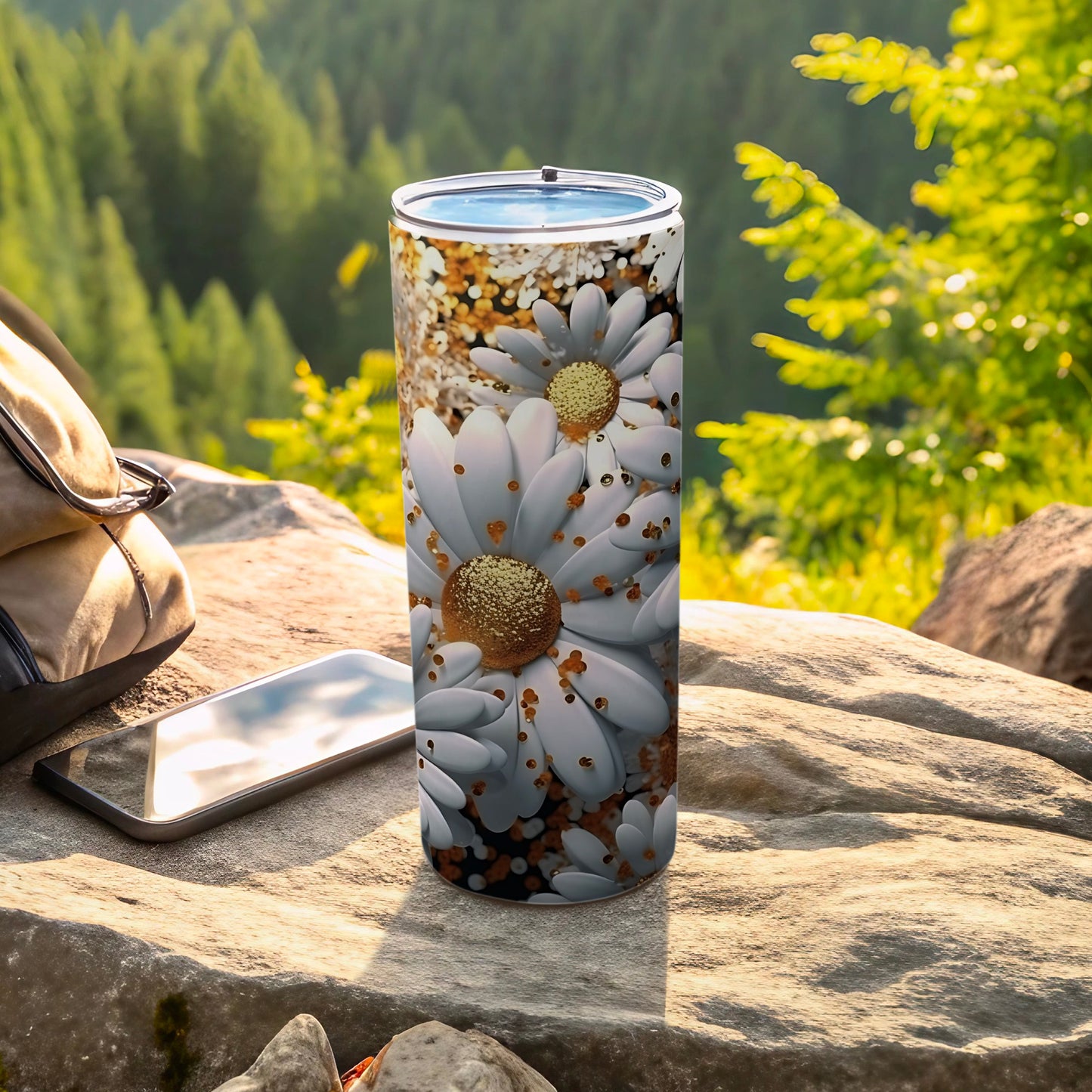 White daisy flowers with gold glitter pattern on a stainless steel tumbler.