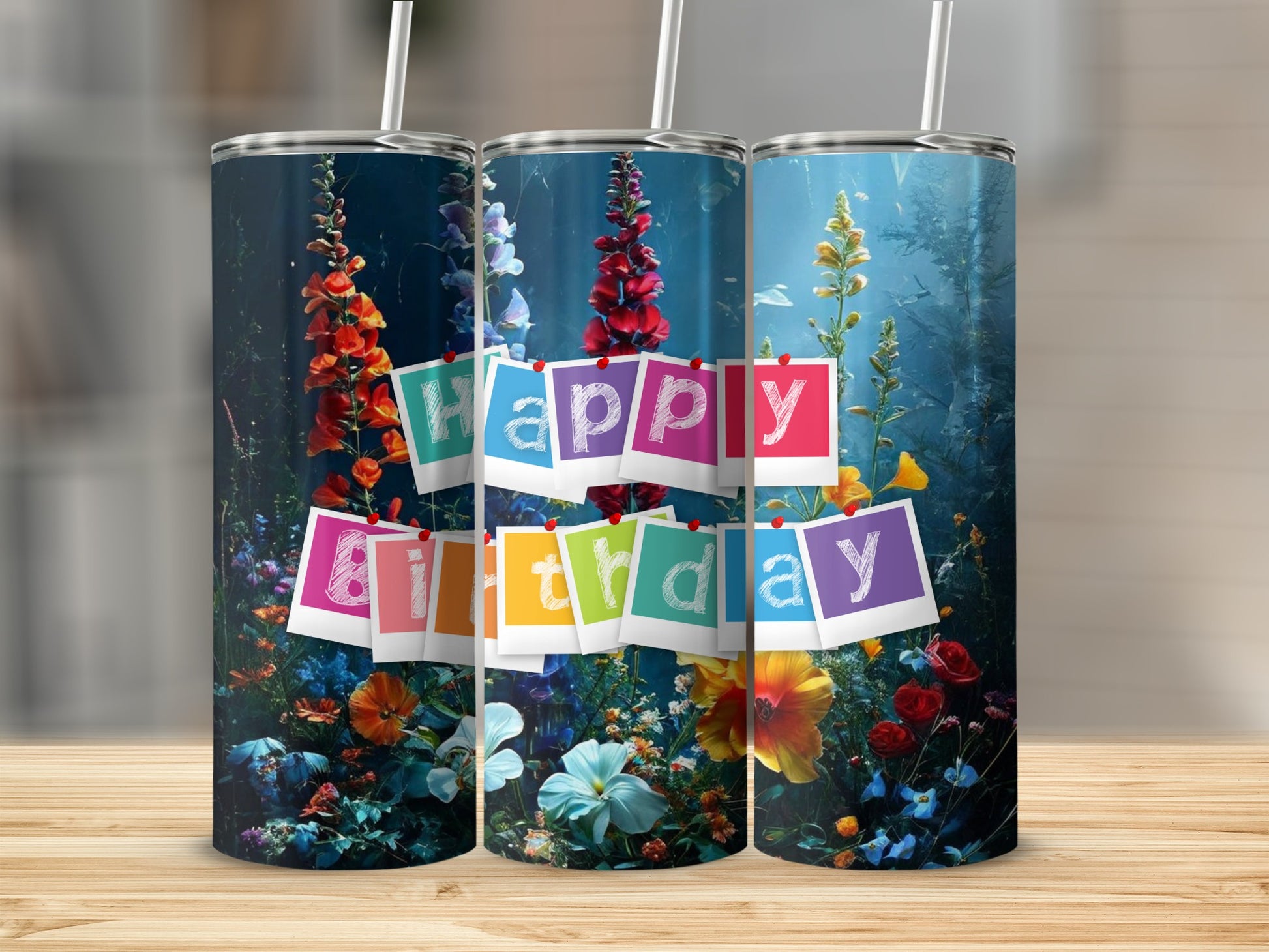 Three tumblers with "Happy Birthday" banner and floral design.