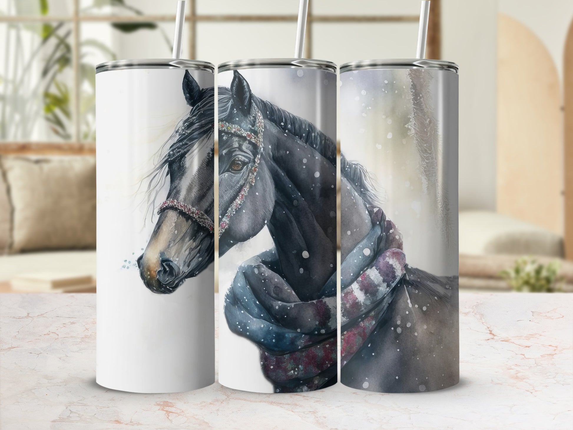 Three tumblers featuring a dark horse with a scarf and snowflakes.