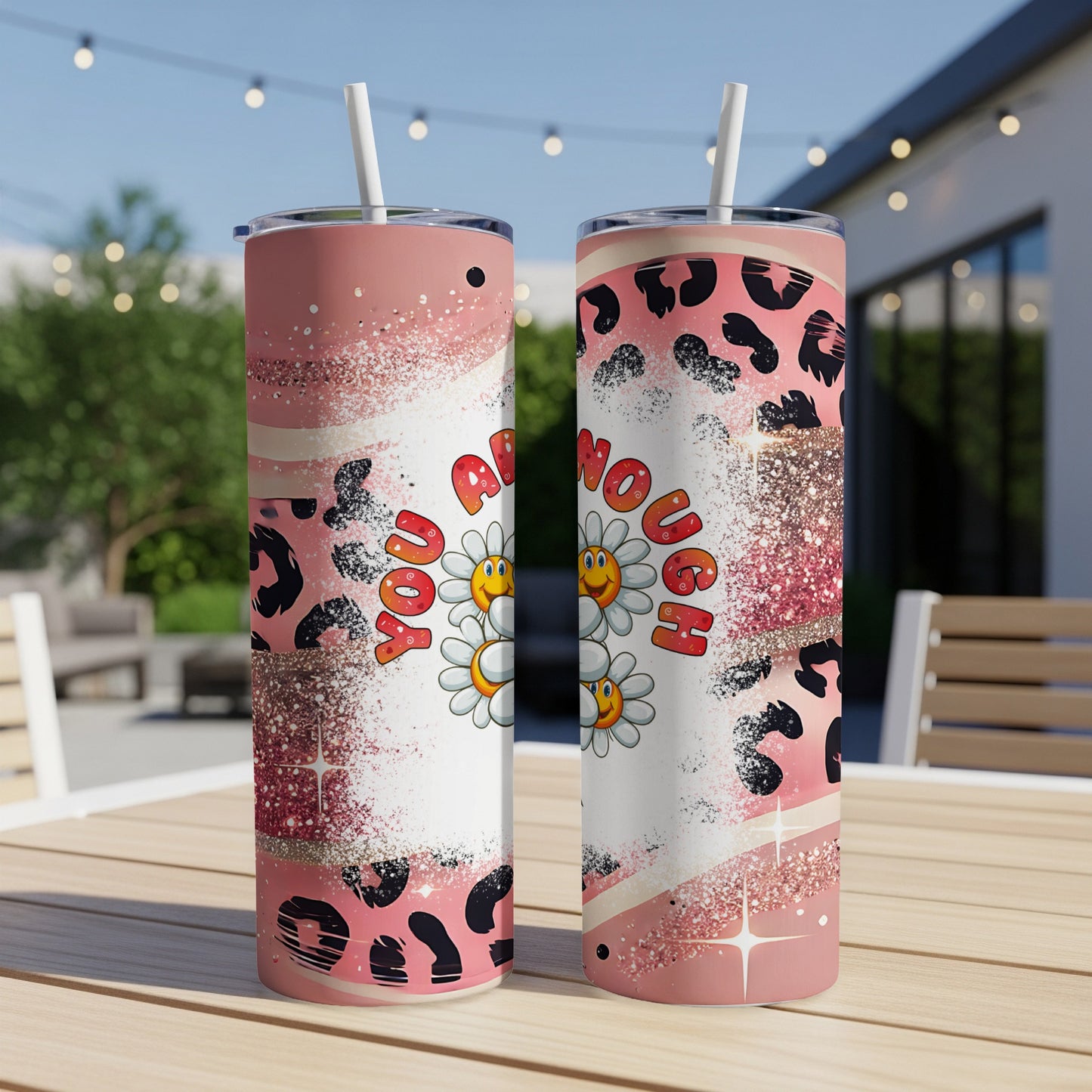 Pink tumbler with leopard print and "you are enough" text, featuring daisies.
