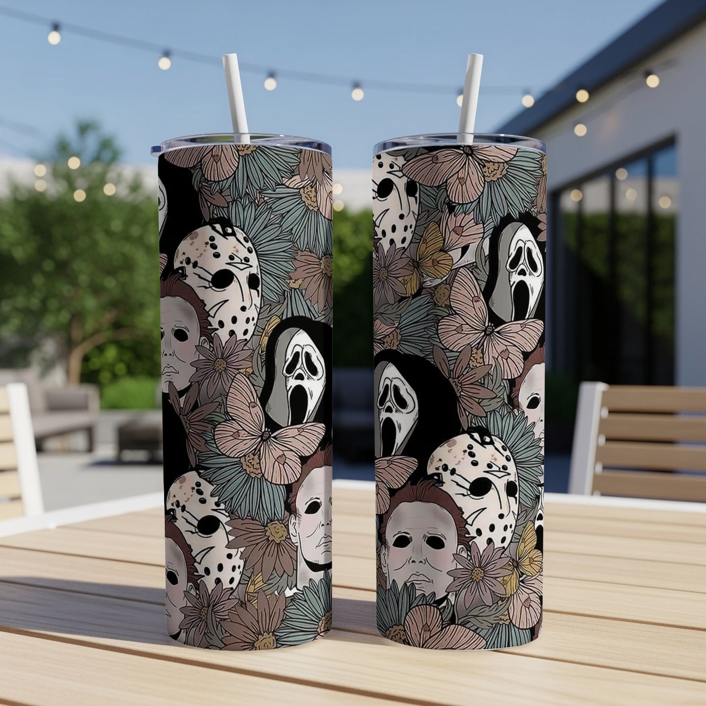 Two tumblers with horror movie character masks and floral pattern.