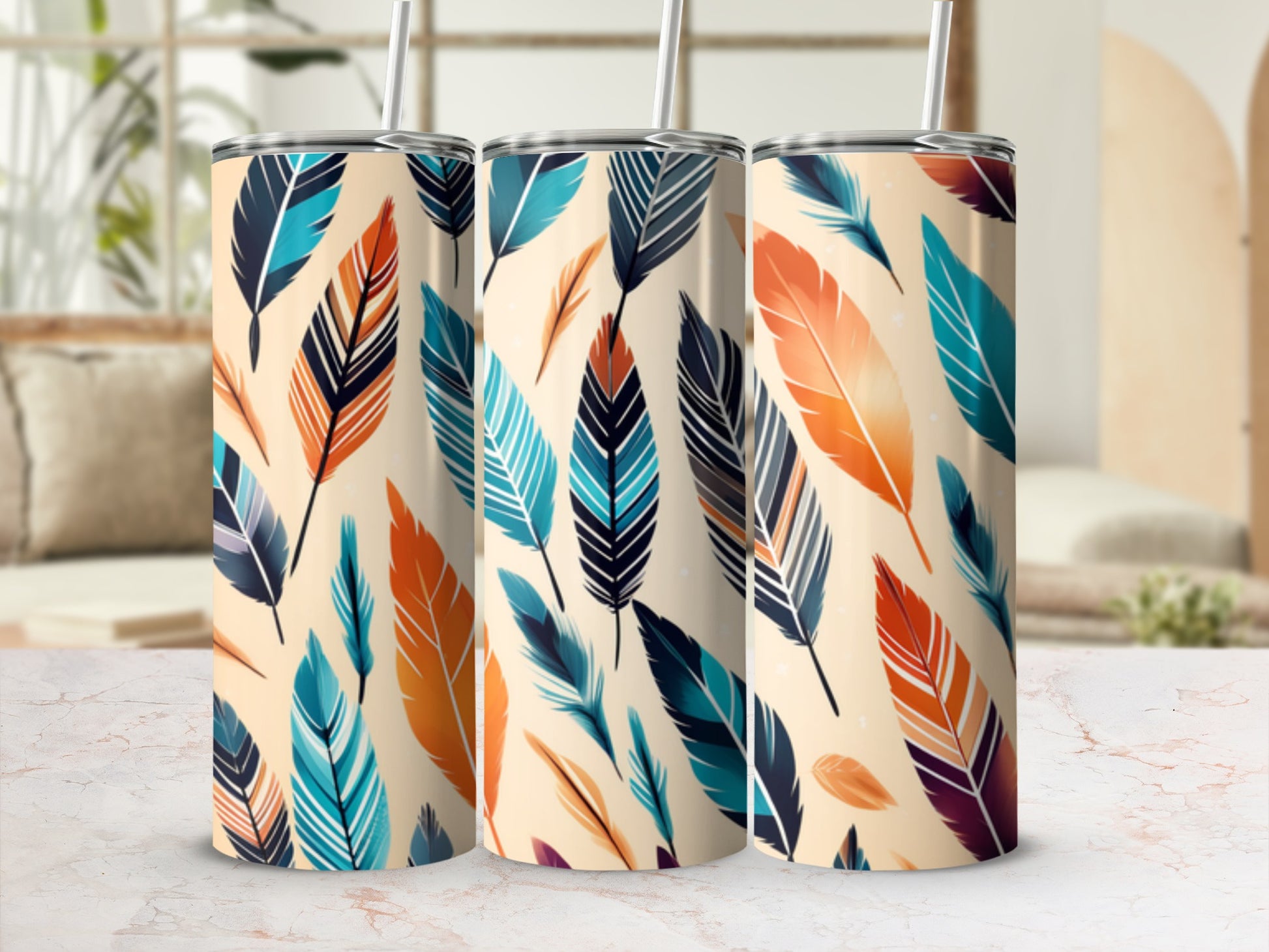 Three tumblers with a repeating pattern of colorful feathers in blues, oranges, and browns.