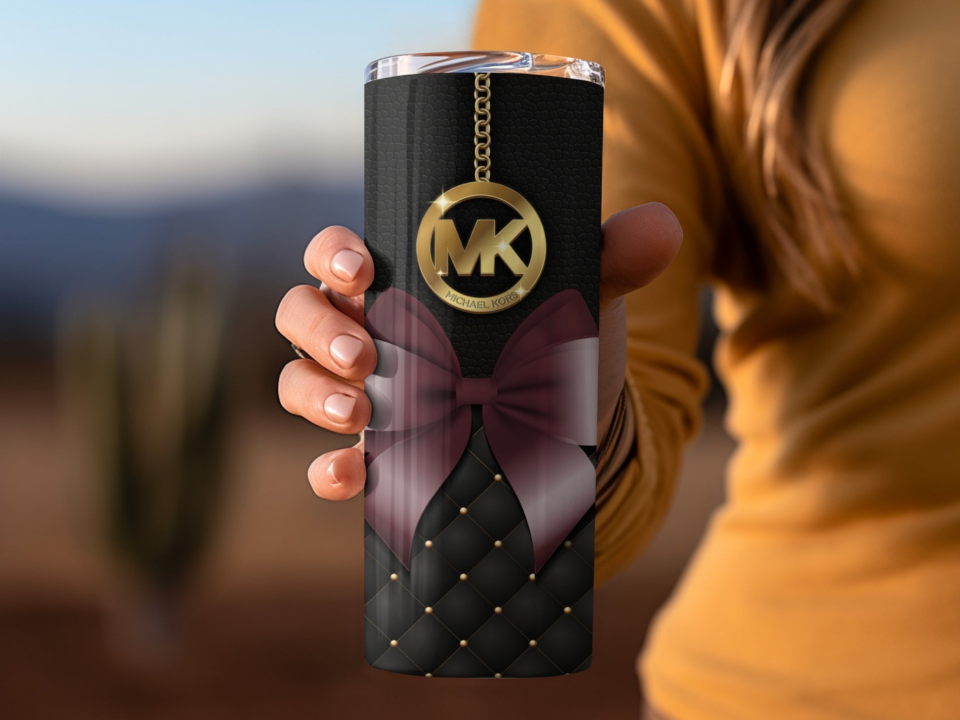 Stylish Black and Gold Tumbler with Elegant Bow Design