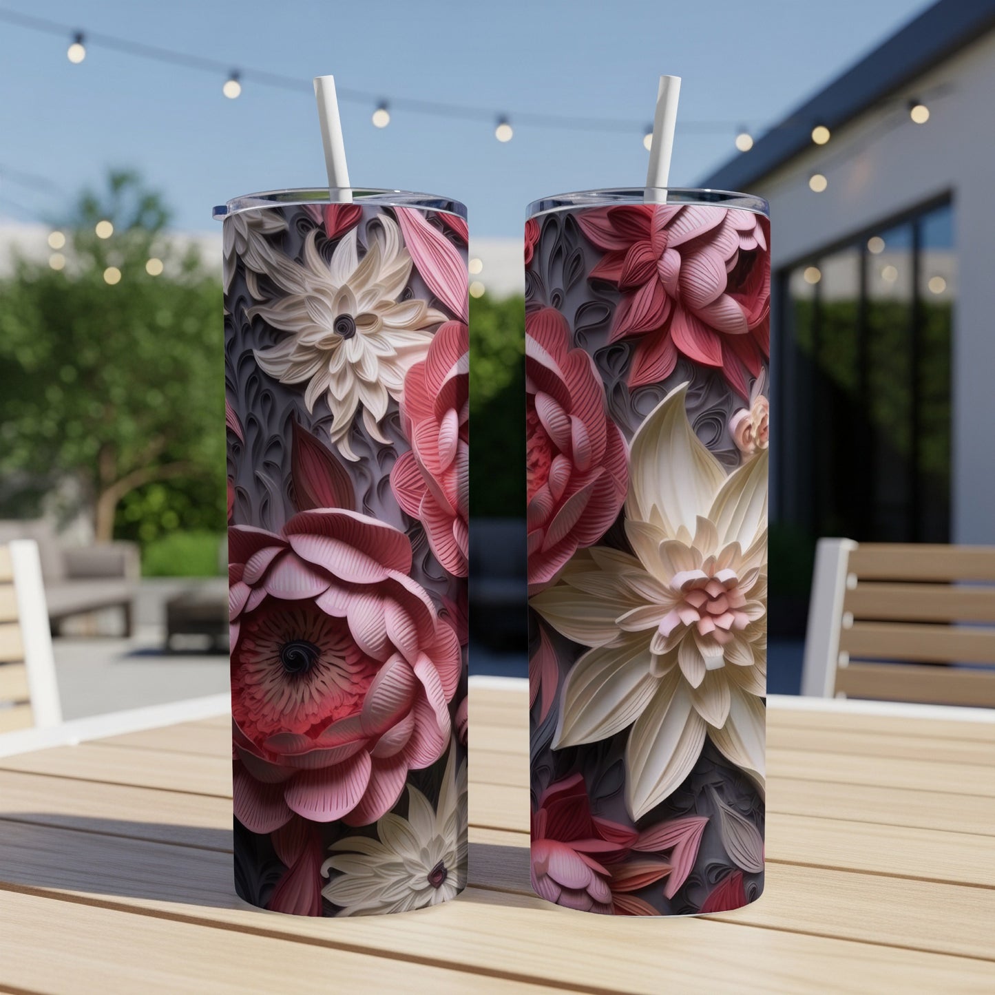 Two tumblers with intricate floral designs in shades of pink and cream.