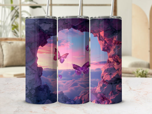 Tumbler with purple butterflies and clouds in a cave-like landscape.
