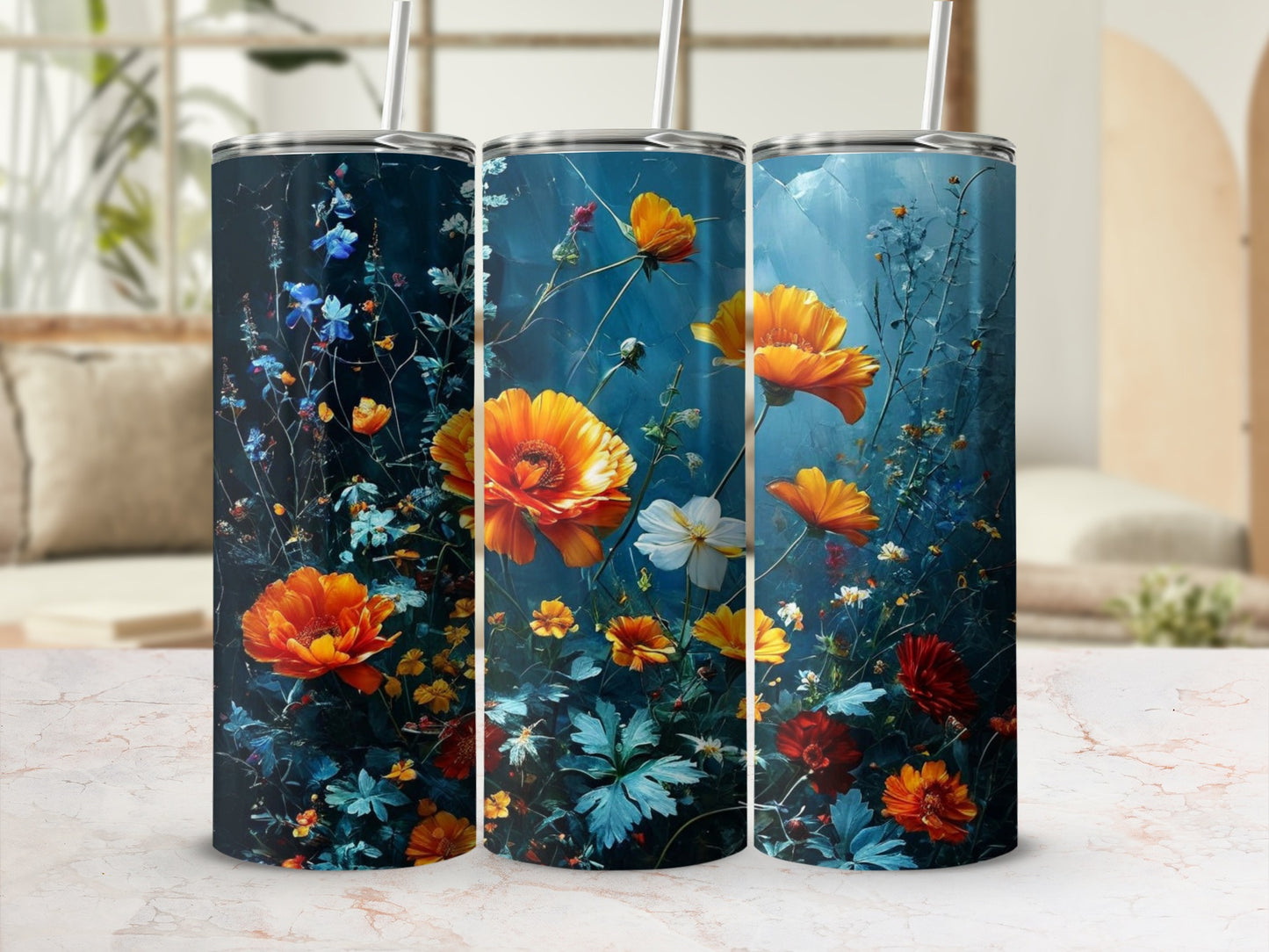 Three tumblers with a dark blue background featuring vibrant orange and red flowers.