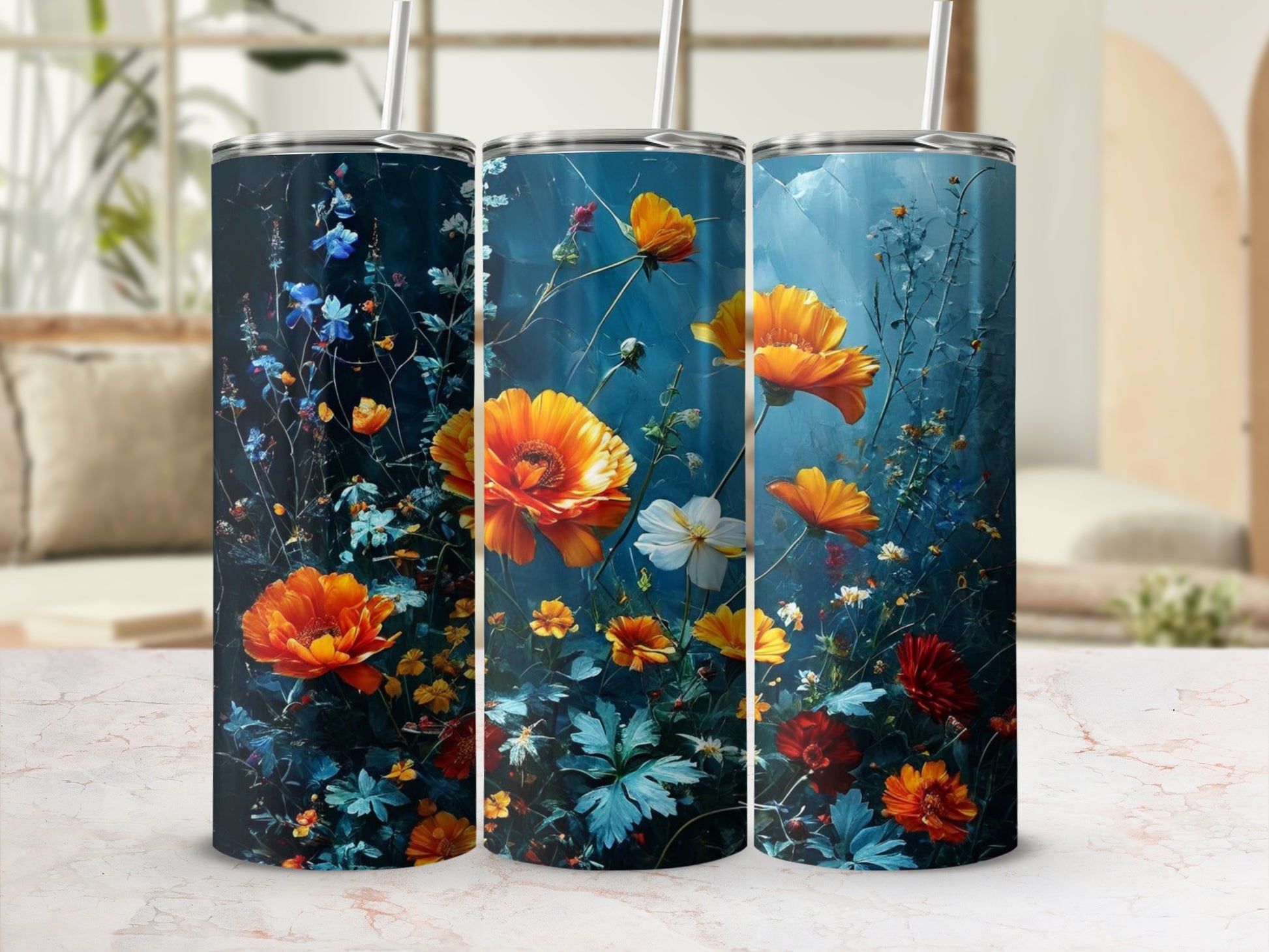Three tumblers with a dark blue background featuring vibrant orange and red flowers.