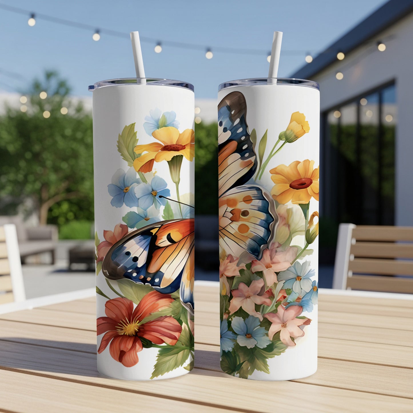 Two tall tumblers featuring a colorful butterfly and floral design.