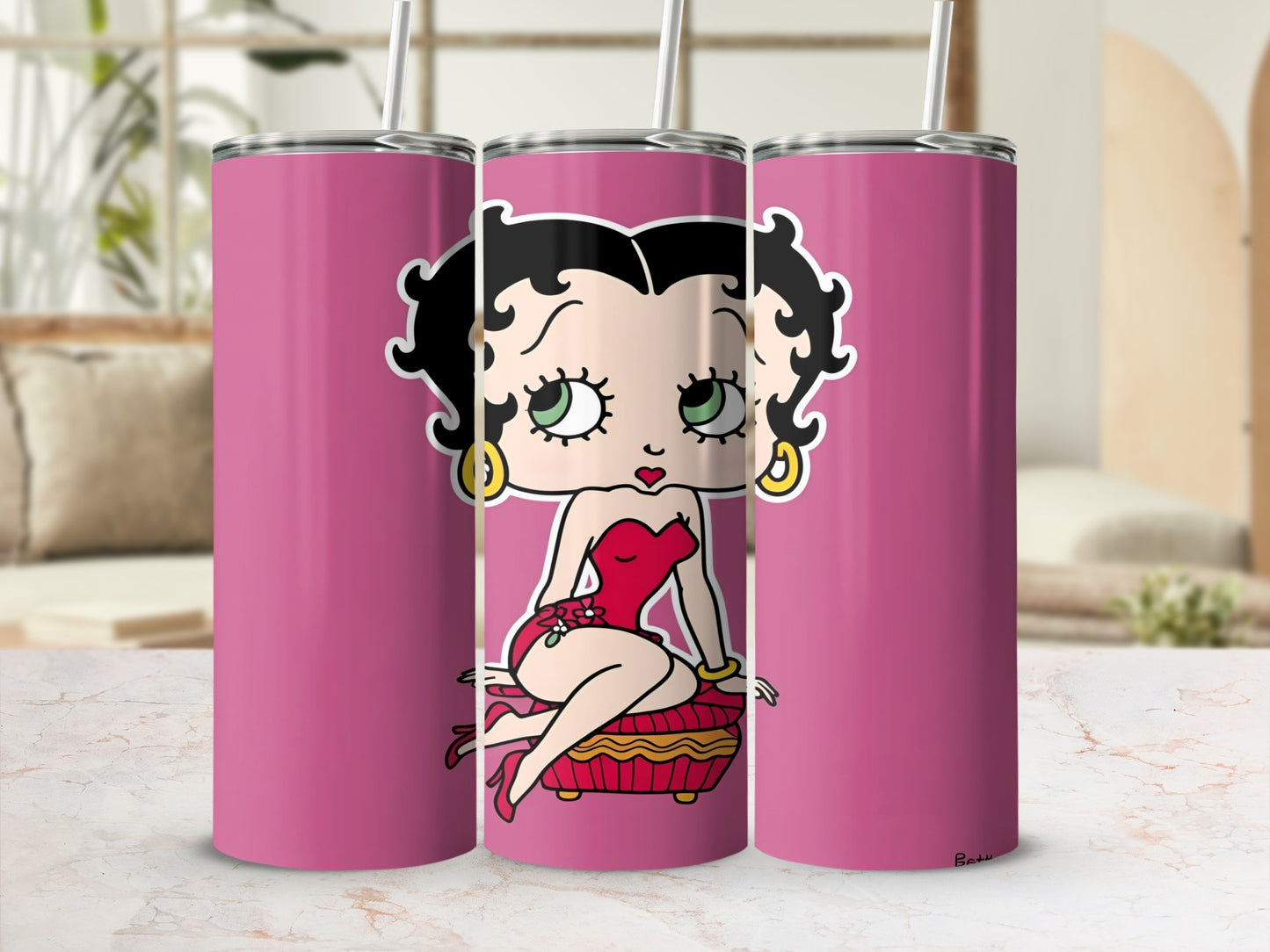 Pink Betty Boop tumbler with gold accents.