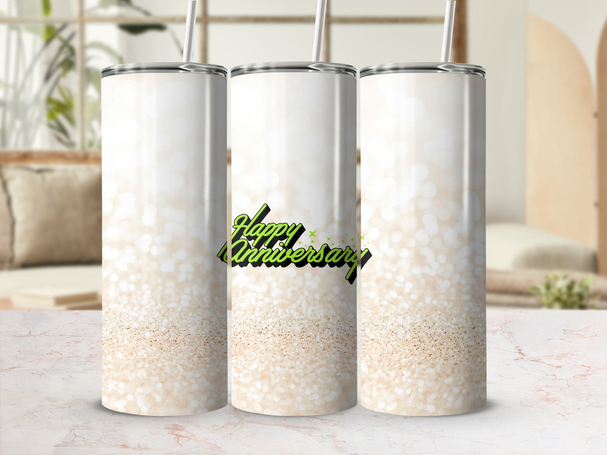Three glitter-covered tumblers with "Happy Anniversary" text.