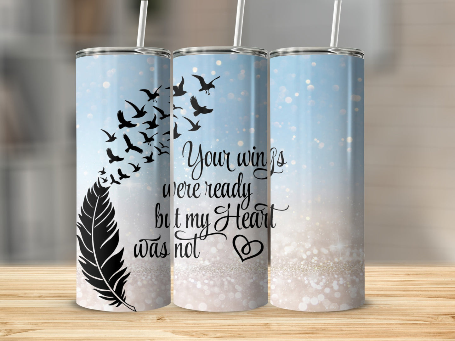 Three tumblers with feather and bird design and text "Your wings were ready but my Heart was not".