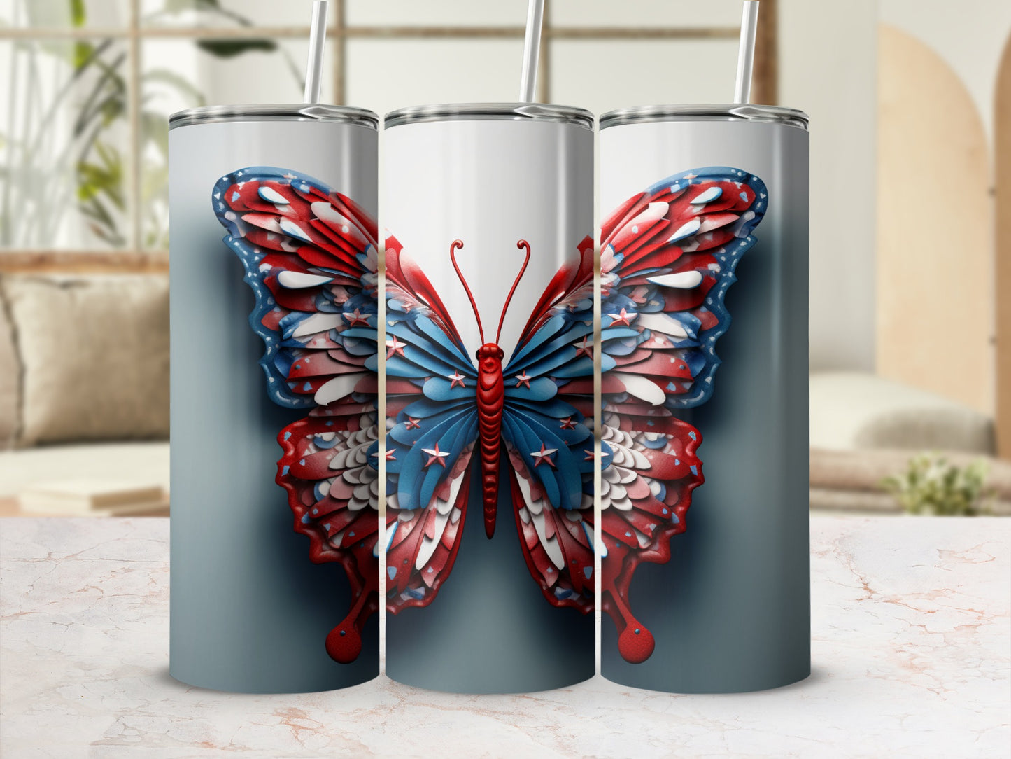 Three tumblers decorated with a patriotic red, white, and blue butterfly design.