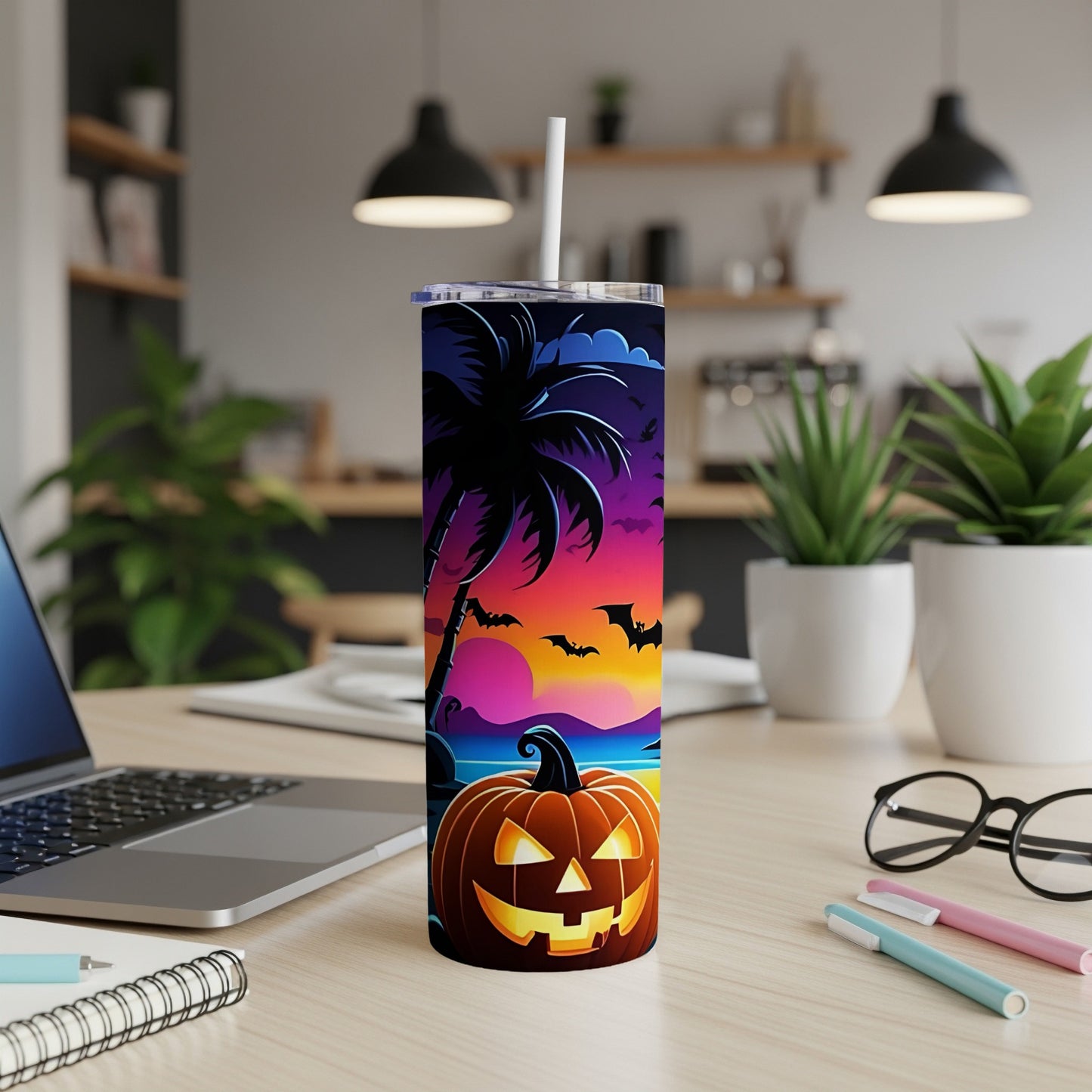 Tumbler with a Halloween tropical sunset design, featuring a jack-o'-lantern and palm tree.