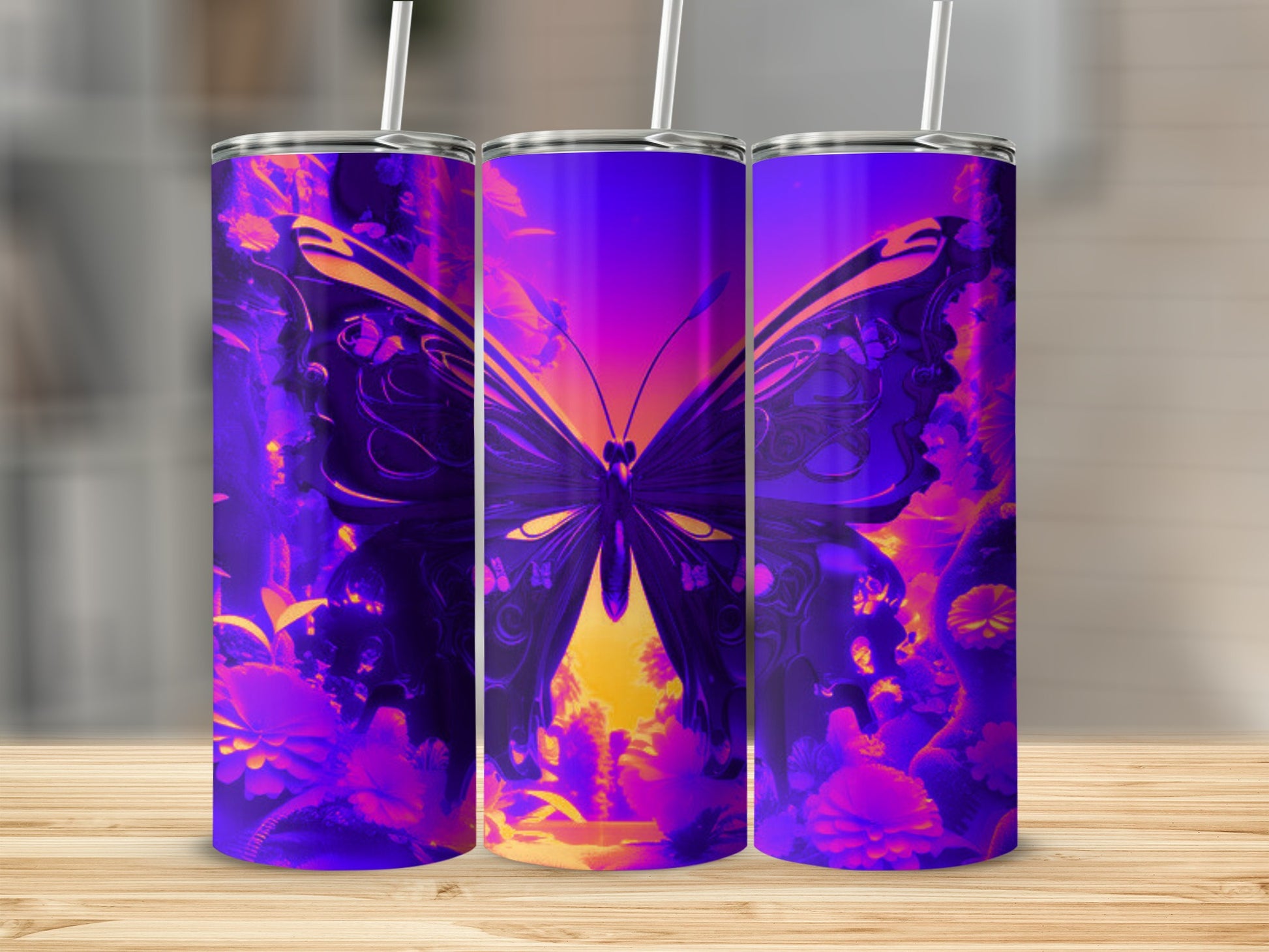 Three tumblers with a vibrant butterfly and floral design.