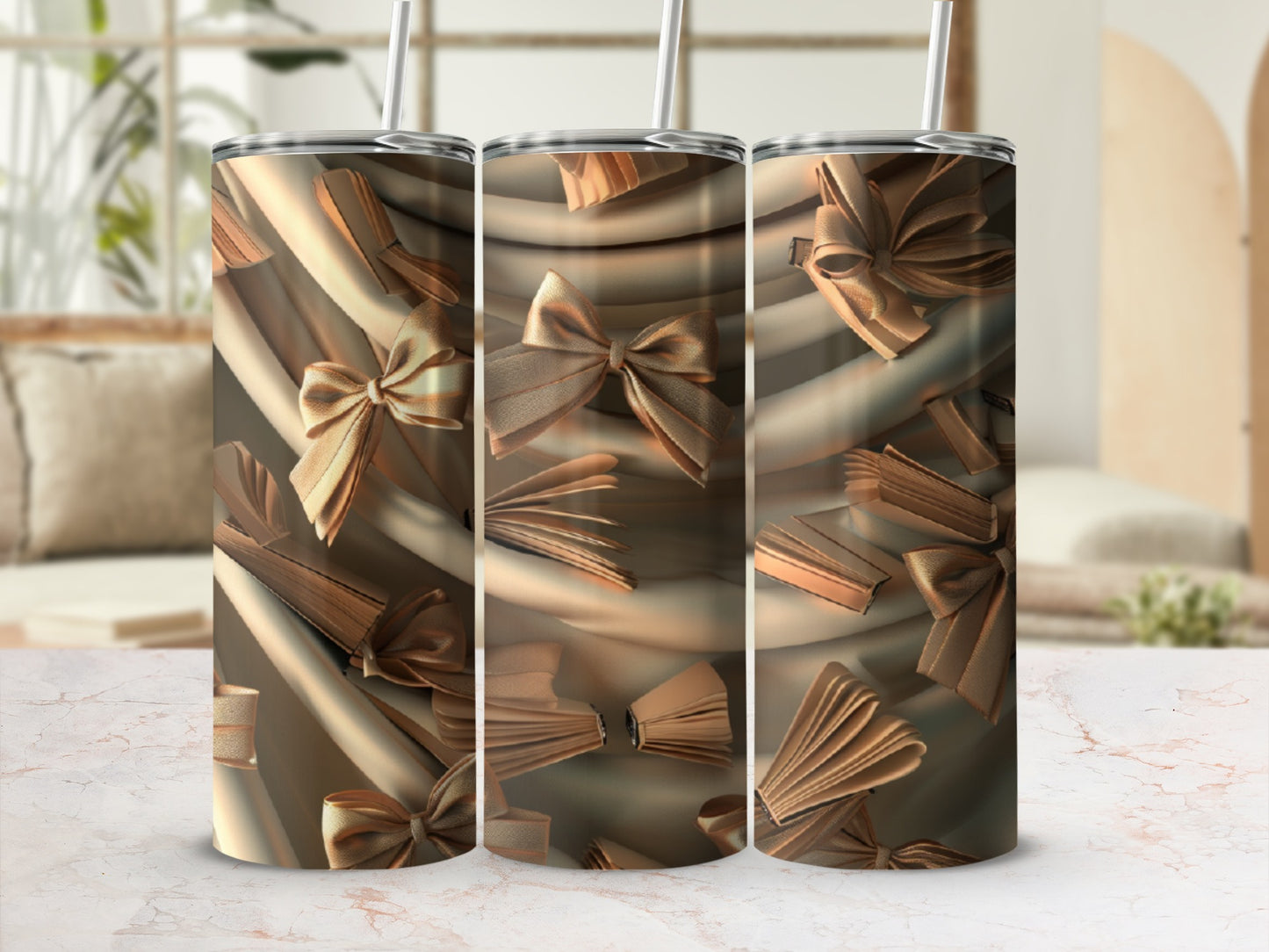 Three tumblers with a pattern of open books and satin bows.
