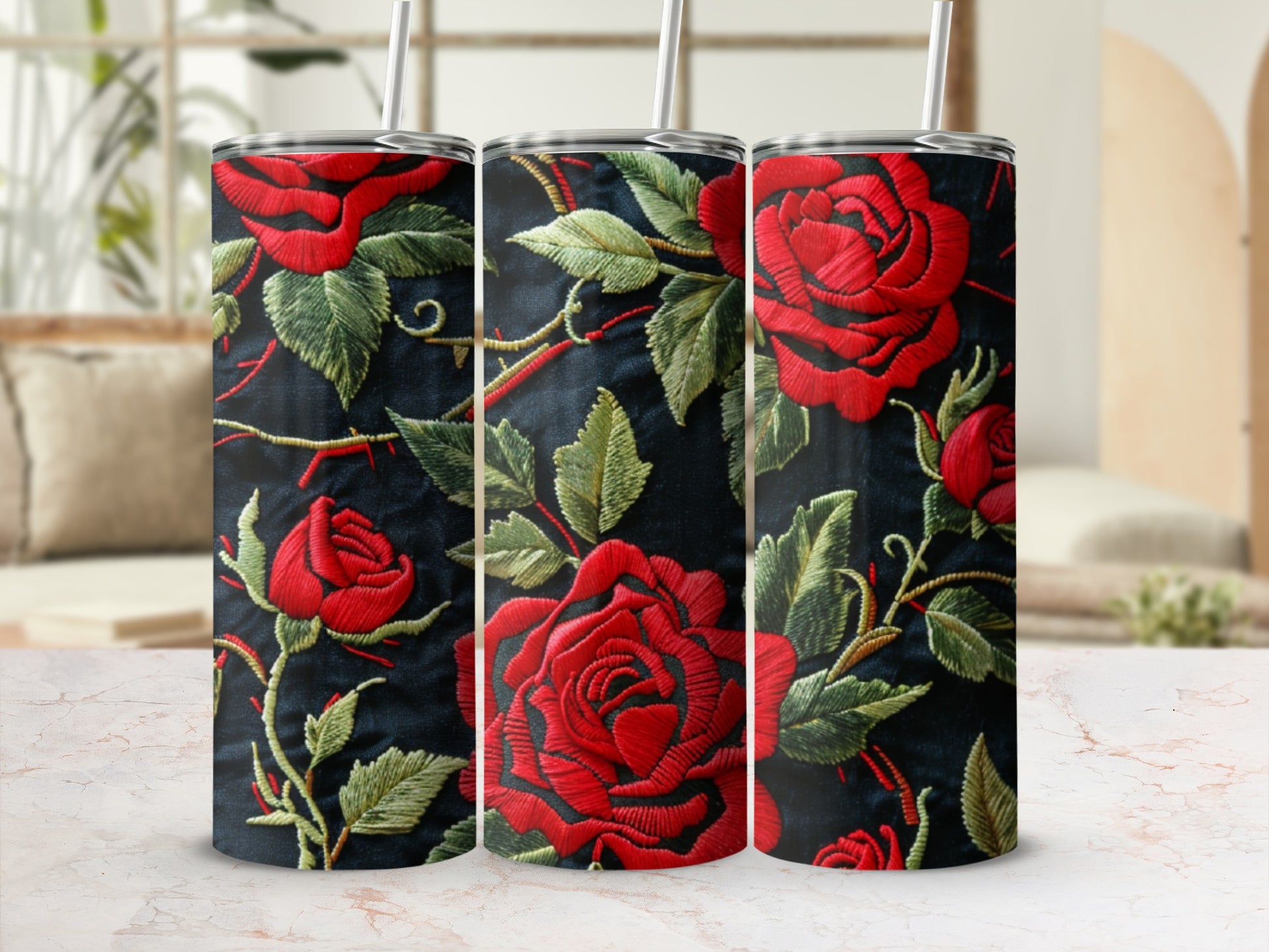 Tumbler with a dark background and red rose floral pattern.