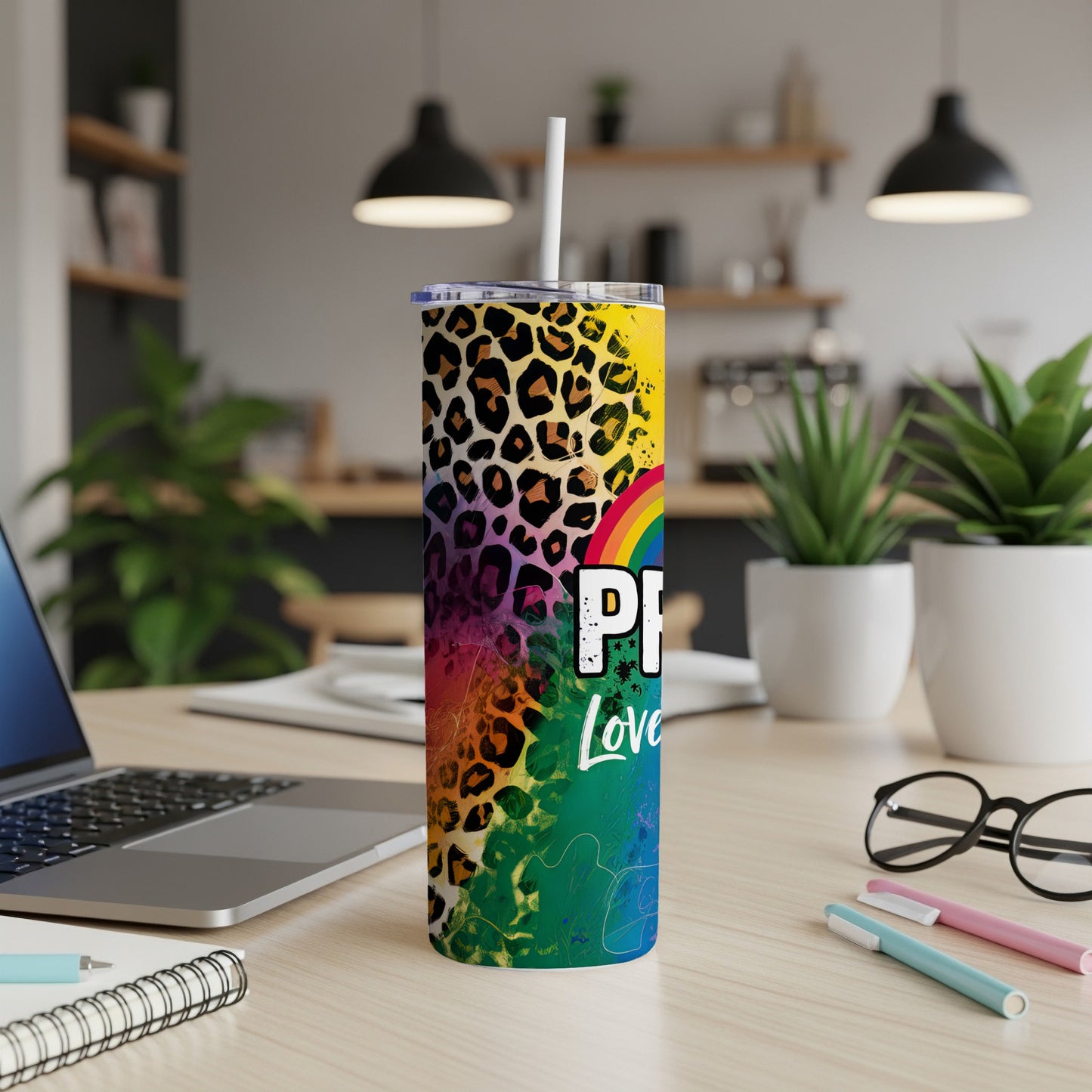 Rainbow and leopard print tumbler with "Pride Love" text.