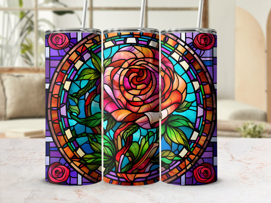 Three stained glass tumblers with a rose design and straw.